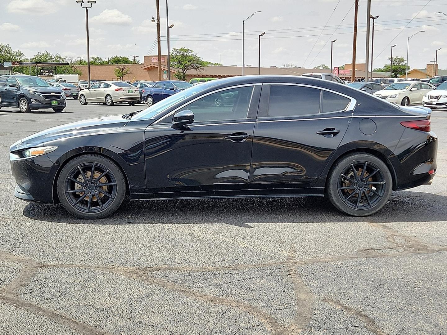 2020 BLACK /Black - BY3 Mazda Mazda3 Sedan Select Package (3MZBPBCM8LM) with an SKYACTIV-G 2.5L I-4 gasoline direct injection, DOHC, variable valve control, regular unleaded, engine with cylinder deactivation and 186HP engine, located at 4711 Ave Q, Lubbock, TX, 79412, (806) 687-2362, 33.551304, -101.855293 - Photo#1
