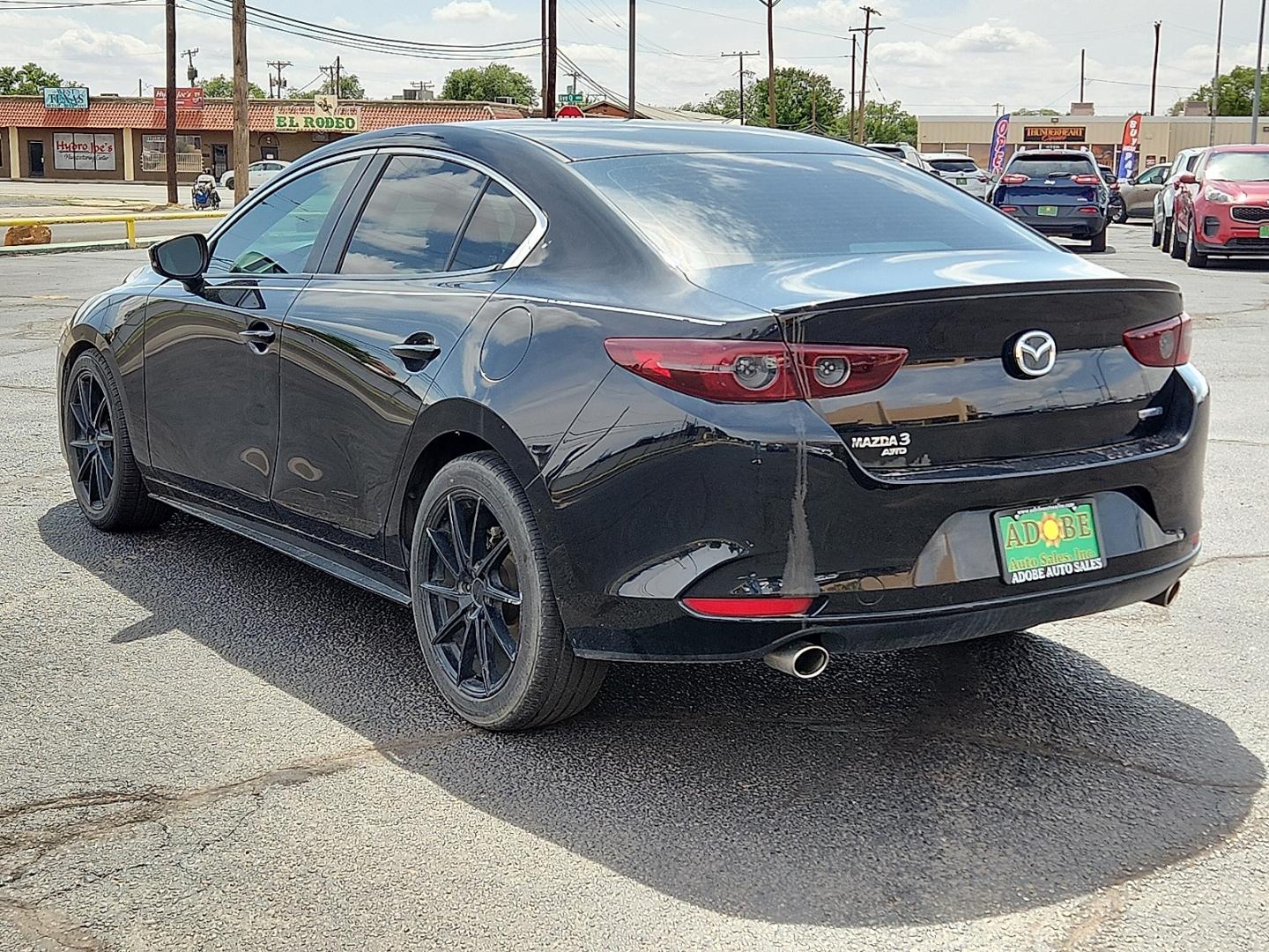 2020 BLACK /Black - BY3 Mazda Mazda3 Sedan Select Package (3MZBPBCM8LM) with an SKYACTIV-G 2.5L I-4 gasoline direct injection, DOHC, variable valve control, regular unleaded, engine with cylinder deactivation and 186HP engine, located at 4711 Ave Q, Lubbock, TX, 79412, (806) 687-2362, 33.551304, -101.855293 - Photo#2