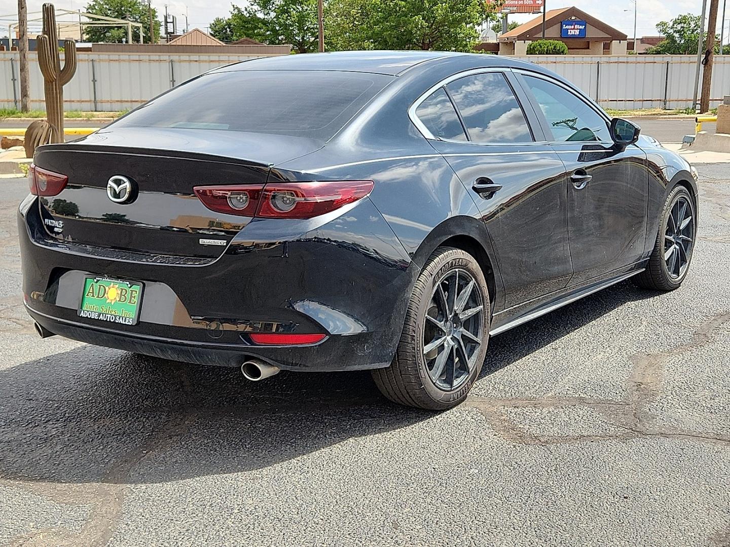 2020 BLACK /Black - BY3 Mazda Mazda3 Sedan Select Package (3MZBPBCM8LM) with an SKYACTIV-G 2.5L I-4 gasoline direct injection, DOHC, variable valve control, regular unleaded, engine with cylinder deactivation and 186HP engine, located at 4711 Ave Q, Lubbock, TX, 79412, (806) 687-2362, 33.551304, -101.855293 - Photo#3