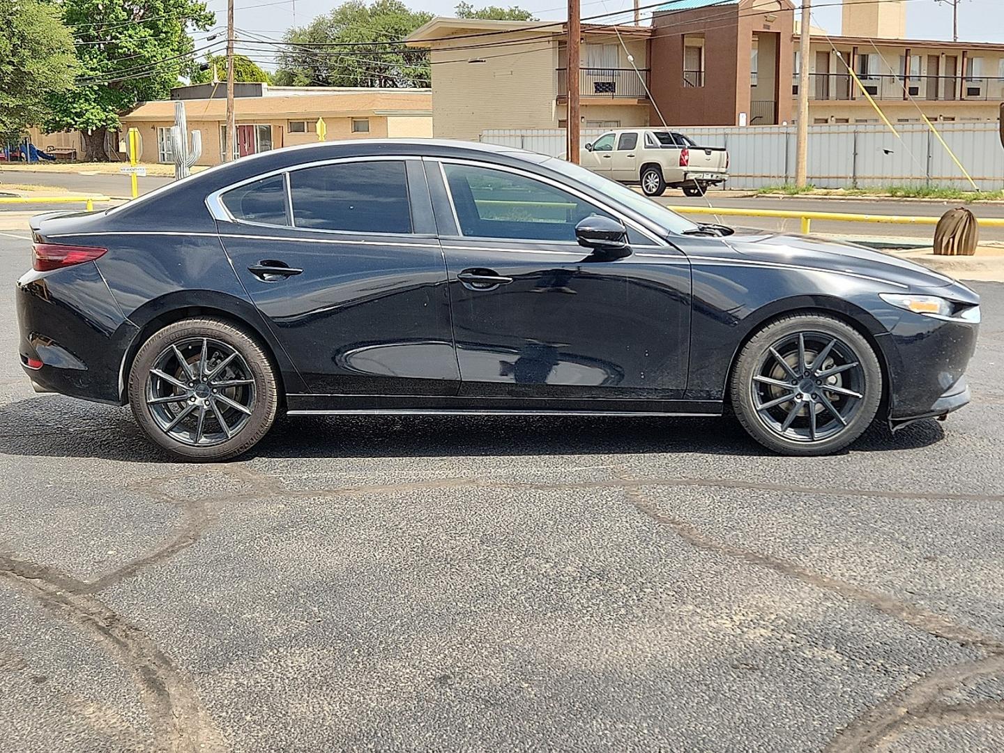 2020 BLACK /Black - BY3 Mazda Mazda3 Sedan Select Package (3MZBPBCM8LM) with an SKYACTIV-G 2.5L I-4 gasoline direct injection, DOHC, variable valve control, regular unleaded, engine with cylinder deactivation and 186HP engine, located at 4711 Ave Q, Lubbock, TX, 79412, (806) 687-2362, 33.551304, -101.855293 - Photo#4
