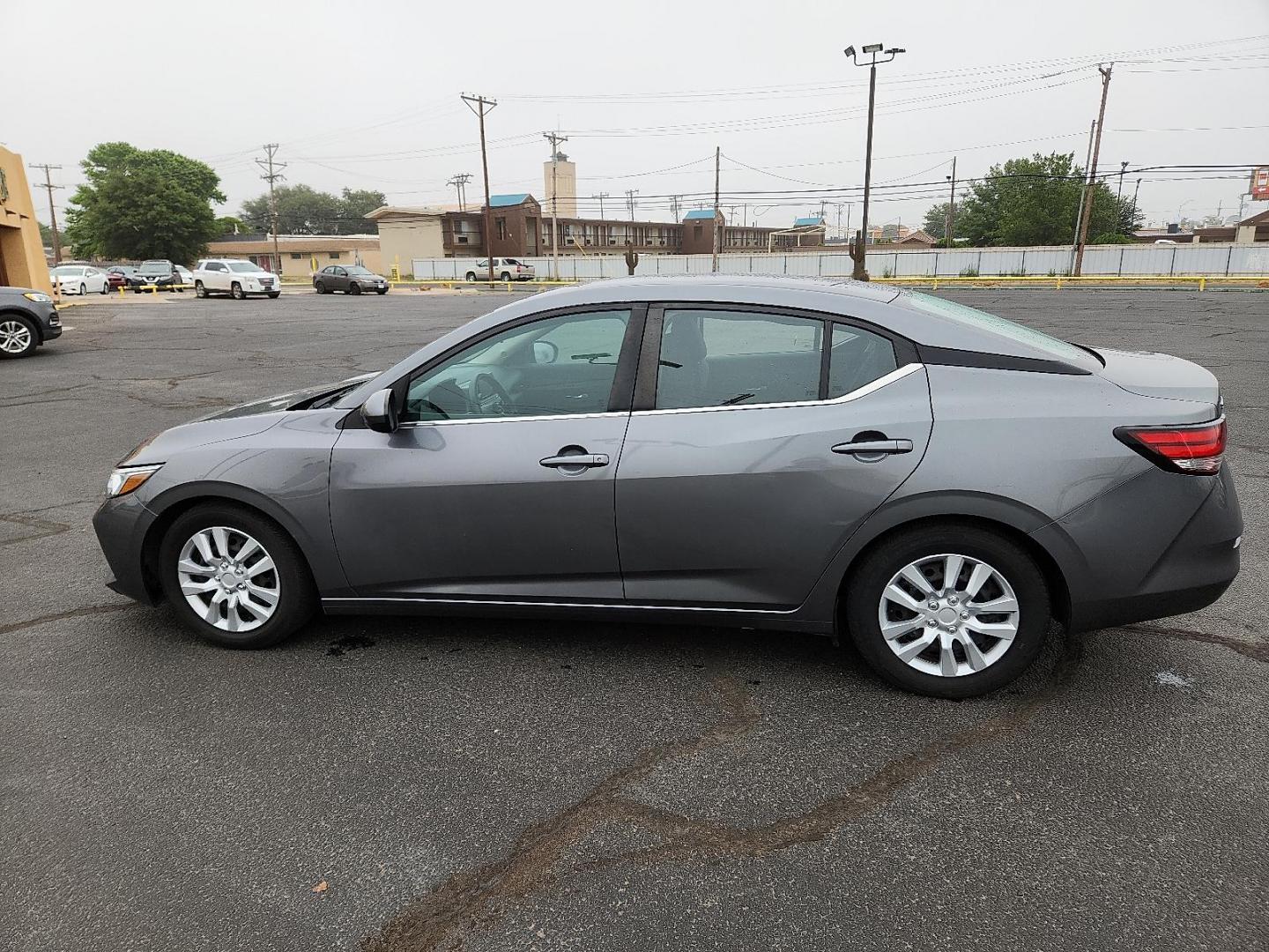 2021 Gun Metallic - KAD /Charcoal - G Nissan Sentra S Xtronic CVT (3N1AB8BV5MY) with an 2L I-4 gasoline direct injection, DOHC, variable valve control, regular unleaded, engine with 149HP engine, located at 4711 Ave Q, Lubbock, TX, 79412, (806) 687-2362, 33.551304, -101.855293 - Photo#1