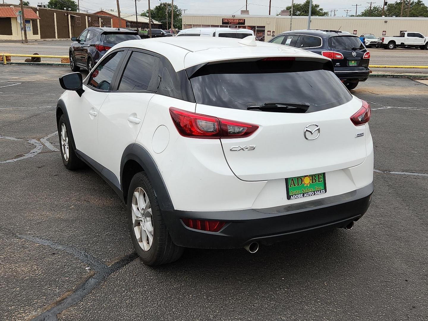 2019 Mazda CX-3 Sport (JM1DKDB70K1) with an SKYACTIV-G 2L I-4 gasoline direct injection, DOHC, variable valve control, regular unleaded, engine with 148HP engine, located at 4711 Ave Q, Lubbock, TX, 79412, (806) 687-2362, 33.551304, -101.855293 - Photo#2