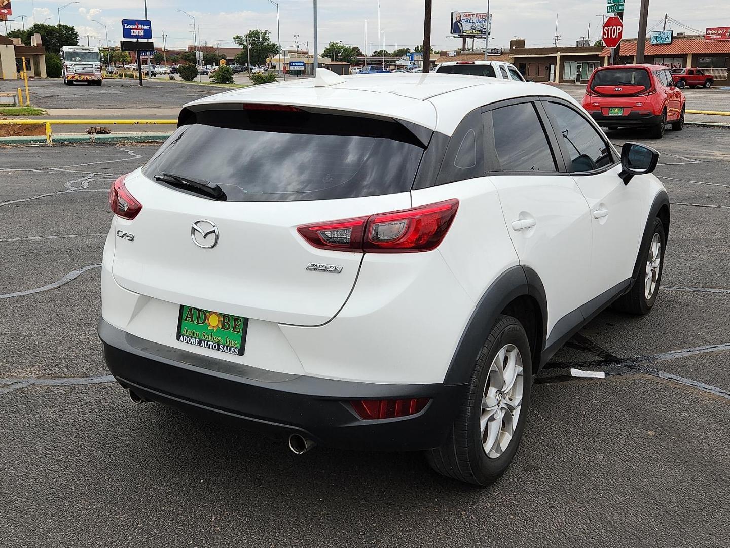 2019 Mazda CX-3 Sport (JM1DKDB70K1) with an SKYACTIV-G 2L I-4 gasoline direct injection, DOHC, variable valve control, regular unleaded, engine with 148HP engine, located at 4711 Ave Q, Lubbock, TX, 79412, (806) 687-2362, 33.551304, -101.855293 - Photo#3