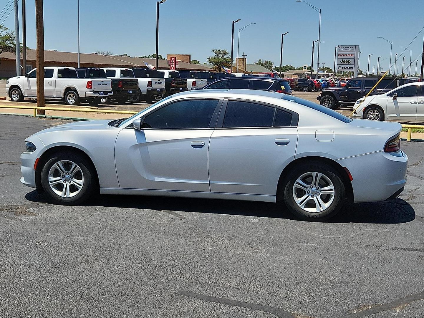 2020 SILVER Dodge Charger SXT RWD (2C3CDXBG9LH) with an Pentastar 3.6L V-6 DOHC, variable valve control, regular unleaded, engine with 292HP engine, located at 4711 Ave Q, Lubbock, TX, 79412, (806) 687-2362, 33.551304, -101.855293 - Photo#1