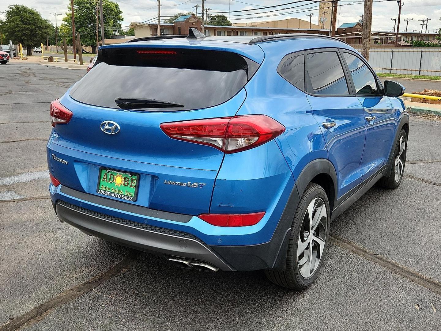 2016 BLUE Hyundai Tucson Limited (KM8J33A21GU) with an 1.6L I-4 gasoline direct injection, DOHC, variable valve control, intercooled turbo, regular unleaded, engine with 175HP engine, located at 4711 Ave Q, Lubbock, TX, 79412, (806) 687-2362, 33.551304, -101.855293 - Photo#3