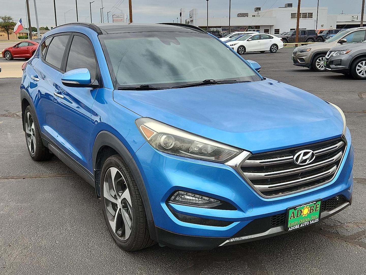 2016 BLUE Hyundai Tucson Limited (KM8J33A21GU) with an 1.6L I-4 gasoline direct injection, DOHC, variable valve control, intercooled turbo, regular unleaded, engine with 175HP engine, located at 4711 Ave Q, Lubbock, TX, 79412, (806) 687-2362, 33.551304, -101.855293 - Photo#5