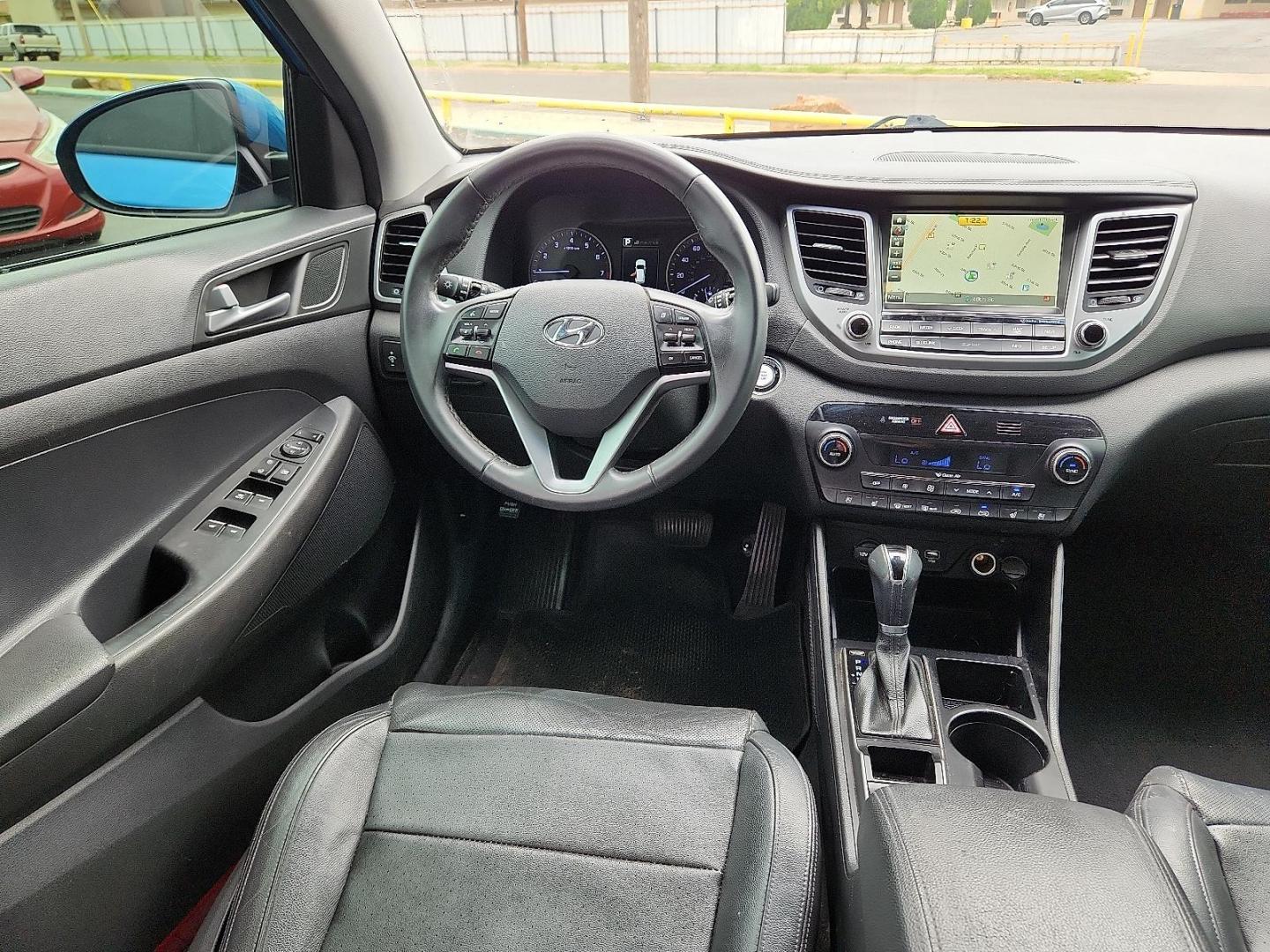 2016 BLUE Hyundai Tucson Limited (KM8J33A21GU) with an 1.6L I-4 gasoline direct injection, DOHC, variable valve control, intercooled turbo, regular unleaded, engine with 175HP engine, located at 4711 Ave Q, Lubbock, TX, 79412, (806) 687-2362, 33.551304, -101.855293 - Photo#9