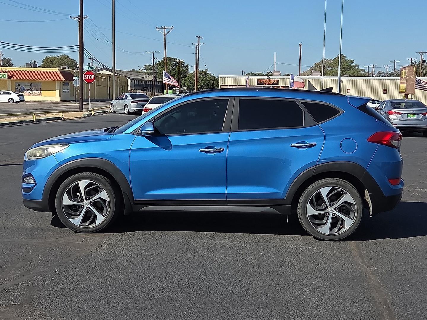 2016 Caribbean Blue - R5U /Black - TRY Hyundai Tucson Limited (KM8J33A21GU) with an 1.6L I-4 direct injection, DOHC, variable valve control, intercooled turbo, regular gasoline, engine with 175HP engine, located at 4711 Ave Q, Lubbock, TX, 79412, (806) 687-2362, 33.551304, -101.855293- Photo#1