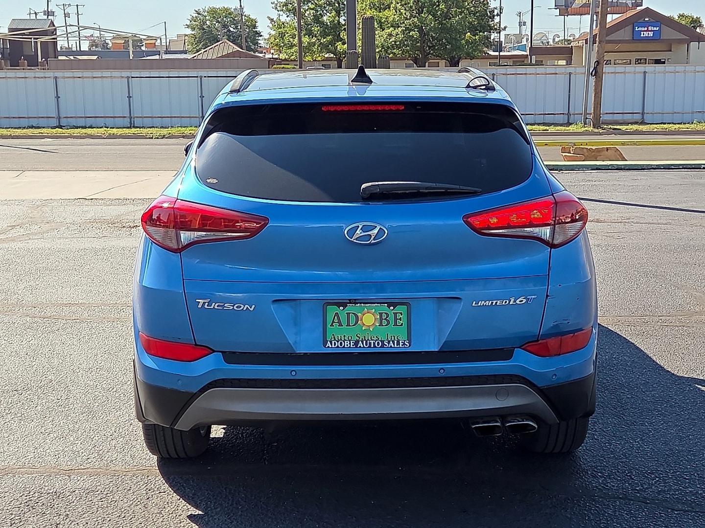 2016 Caribbean Blue - R5U /Black - TRY Hyundai Tucson Limited (KM8J33A21GU) with an 1.6L I-4 direct injection, DOHC, variable valve control, intercooled turbo, regular gasoline, engine with 175HP engine, located at 4711 Ave Q, Lubbock, TX, 79412, (806) 687-2362, 33.551304, -101.855293- Photo#3