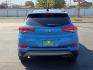 2016 Caribbean Blue - R5U /Black - TRY Hyundai Tucson Limited (KM8J33A21GU) with an 1.6L I-4 direct injection, DOHC, variable valve control, intercooled turbo, regular gasoline, engine with 175HP engine, located at 4711 Ave Q, Lubbock, TX, 79412, (806) 687-2362, 33.551304, -101.855293- Photo#3