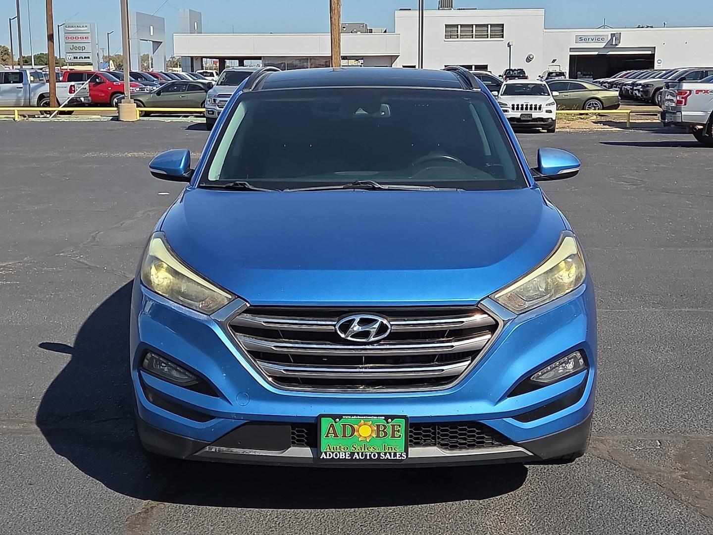 2016 Caribbean Blue - R5U /Black - TRY Hyundai Tucson Limited (KM8J33A21GU) with an 1.6L I-4 direct injection, DOHC, variable valve control, intercooled turbo, regular gasoline, engine with 175HP engine, located at 4711 Ave Q, Lubbock, TX, 79412, (806) 687-2362, 33.551304, -101.855293- Photo#7