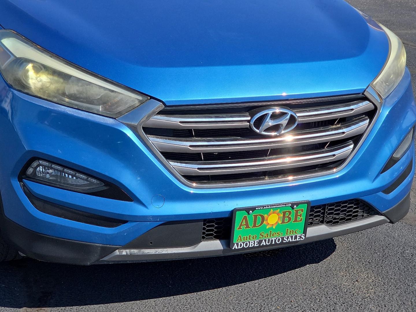 2016 Caribbean Blue - R5U /Black - TRY Hyundai Tucson Limited (KM8J33A21GU) with an 1.6L I-4 direct injection, DOHC, variable valve control, intercooled turbo, regular gasoline, engine with 175HP engine, located at 4711 Ave Q, Lubbock, TX, 79412, (806) 687-2362, 33.551304, -101.855293- Photo#8