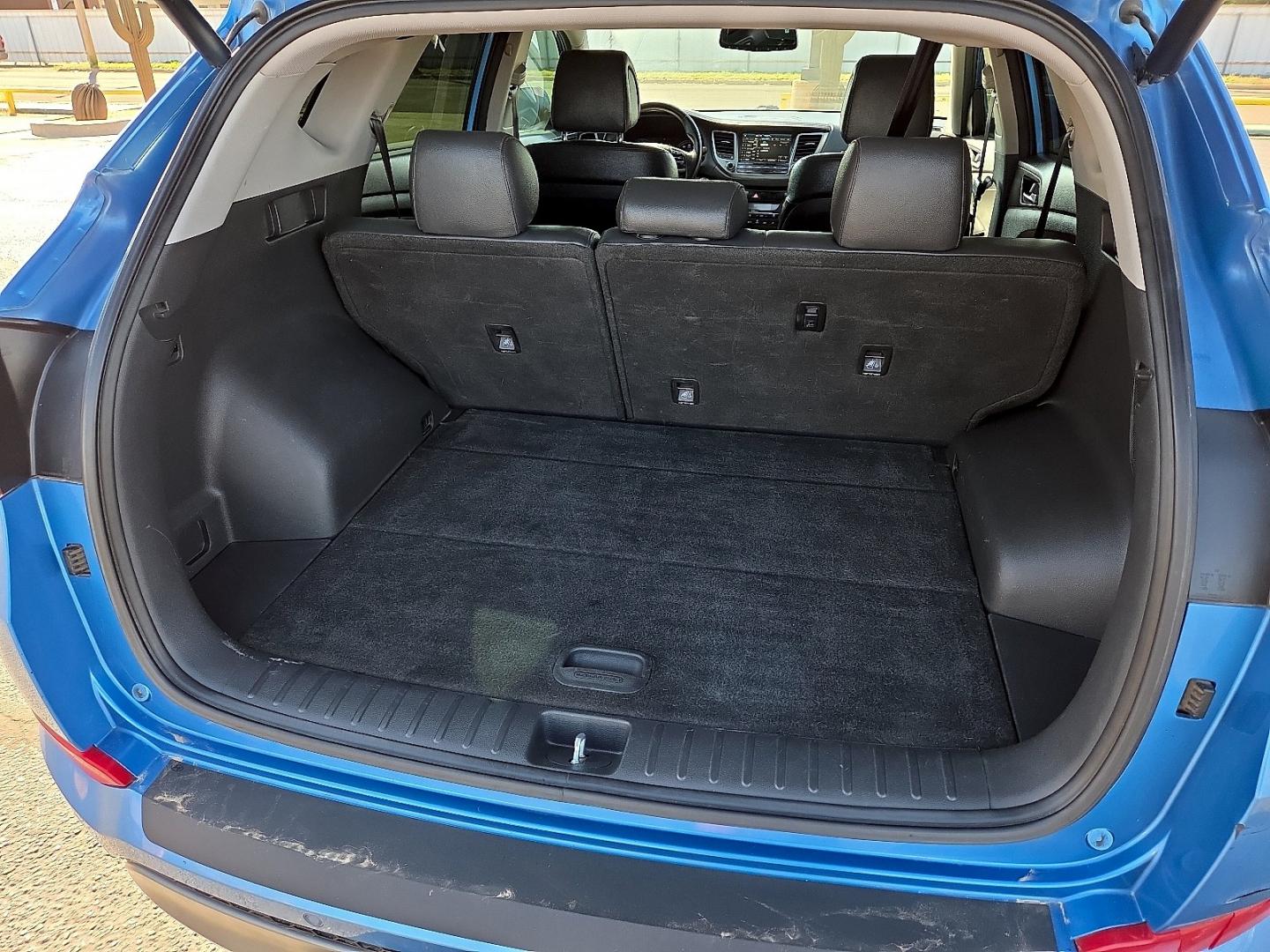 2016 Caribbean Blue - R5U /Black - TRY Hyundai Tucson Limited (KM8J33A21GU) with an 1.6L I-4 direct injection, DOHC, variable valve control, intercooled turbo, regular gasoline, engine with 175HP engine, located at 4711 Ave Q, Lubbock, TX, 79412, (806) 687-2362, 33.551304, -101.855293- Photo#14