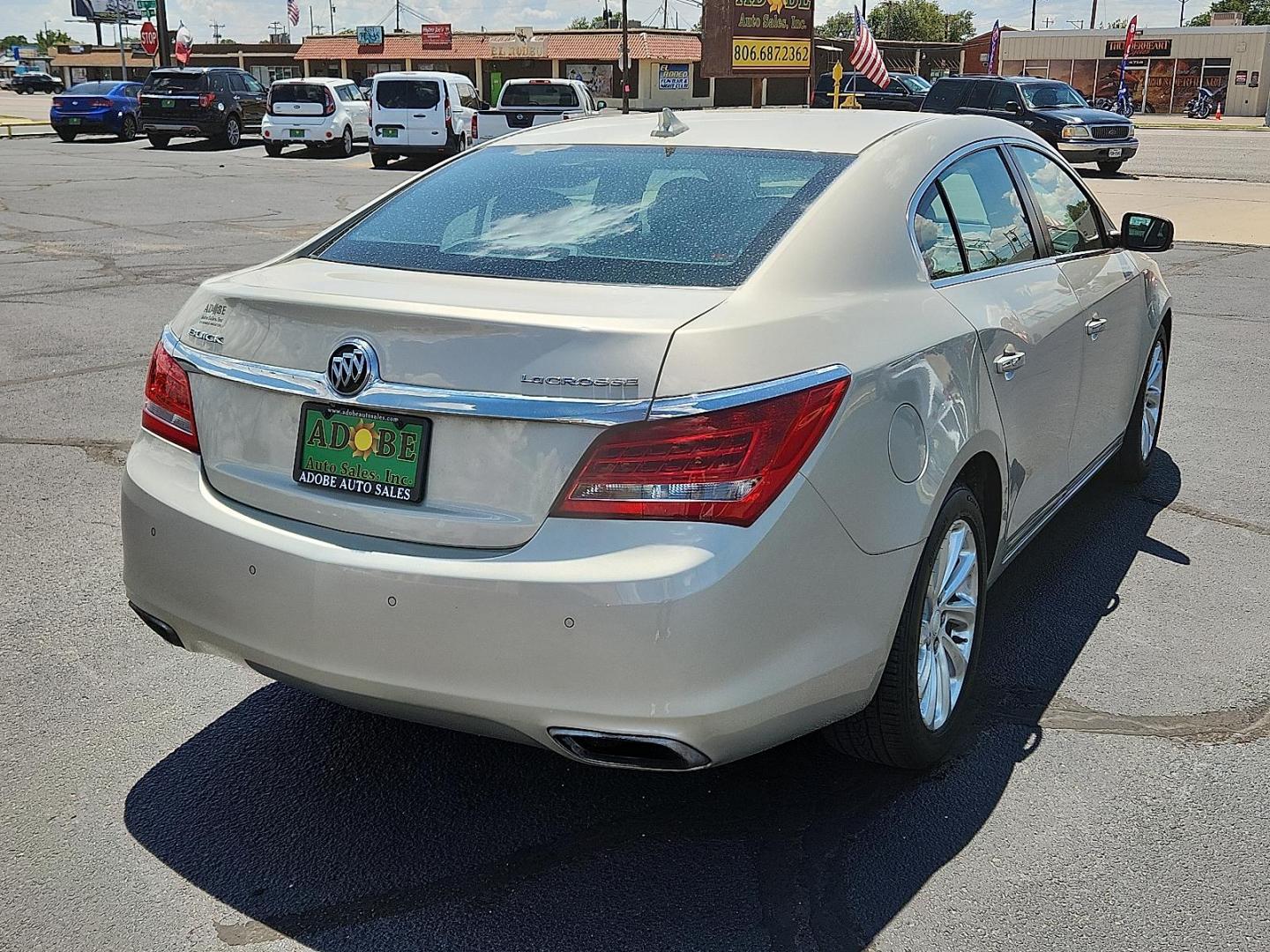 2014 GOLD Buick LaCrosse Leather Group (1G4GB5G37EF) with an 3.6L V-6 gasoline direct injection, DOHC, variable valve control, regular unleaded, engine with 304HP engine, located at 4711 Ave Q, Lubbock, TX, 79412, (806) 687-2362, 33.551304, -101.855293 - Photo#3