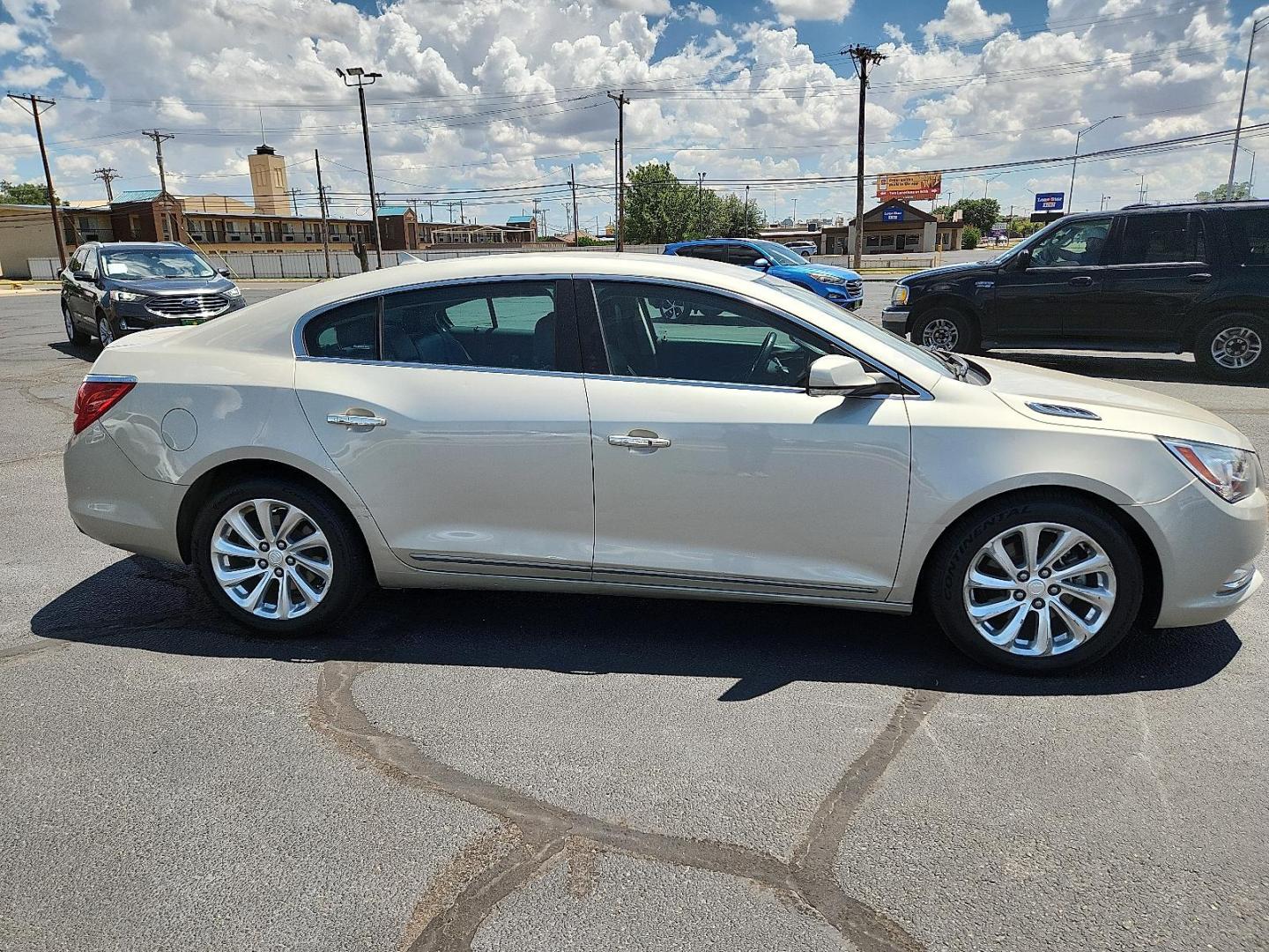 2014 GOLD Buick LaCrosse Leather Group (1G4GB5G37EF) with an 3.6L V-6 gasoline direct injection, DOHC, variable valve control, regular unleaded, engine with 304HP engine, located at 4711 Ave Q, Lubbock, TX, 79412, (806) 687-2362, 33.551304, -101.855293 - Photo#4