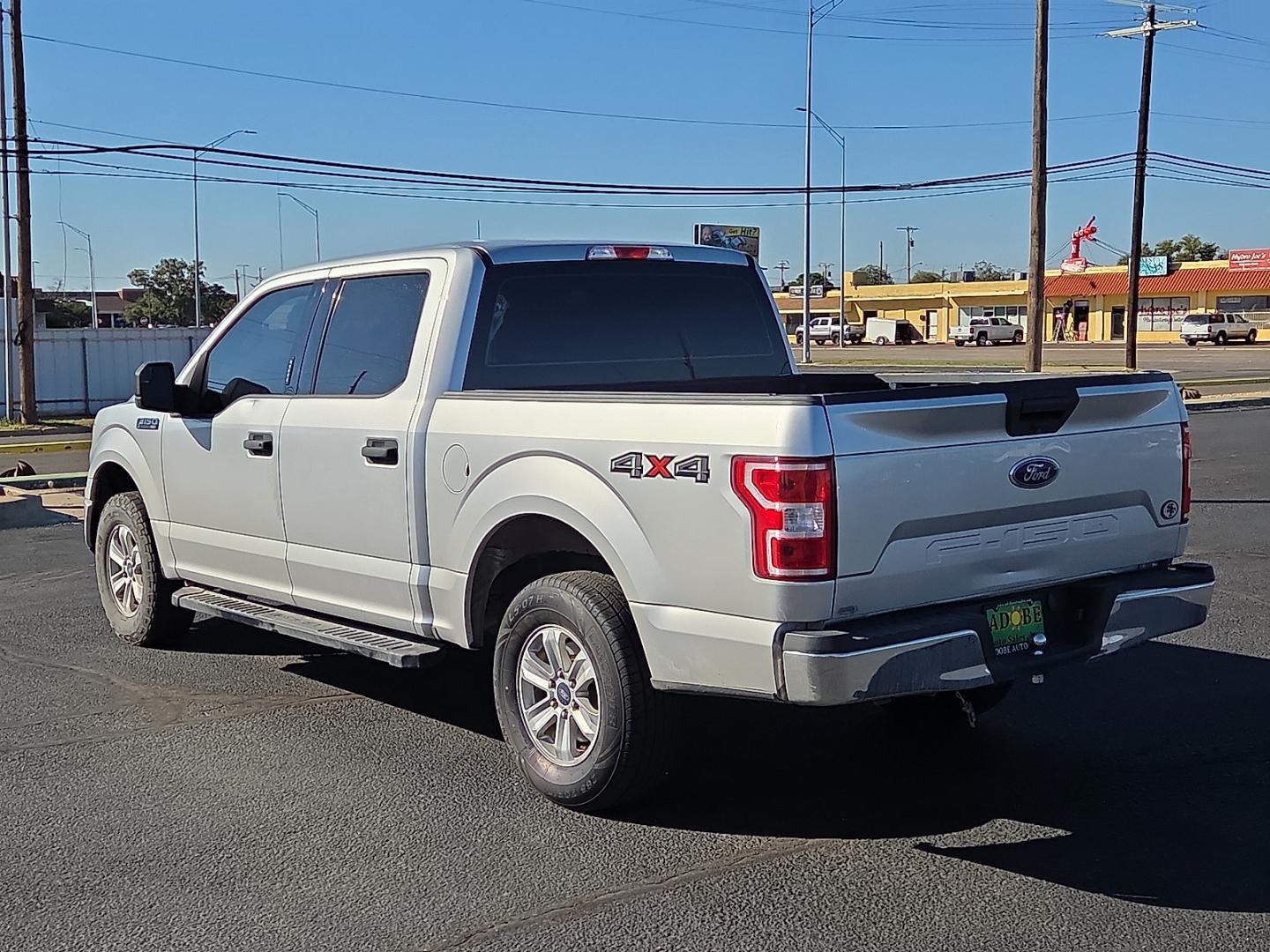 2018 Ingot Silver Metallic - UX /Medium Earth Gray - MG Ford F-150 XLT (1FTEW1EB6JF) with an 3.3L V-6 port/direct injection, DOHC, Ti-VCT variable valve control, regular gasoline, engine with 290HP engine, located at 4711 Ave Q, Lubbock, TX, 79412, (806) 687-2362, 33.551304, -101.855293- Photo#2