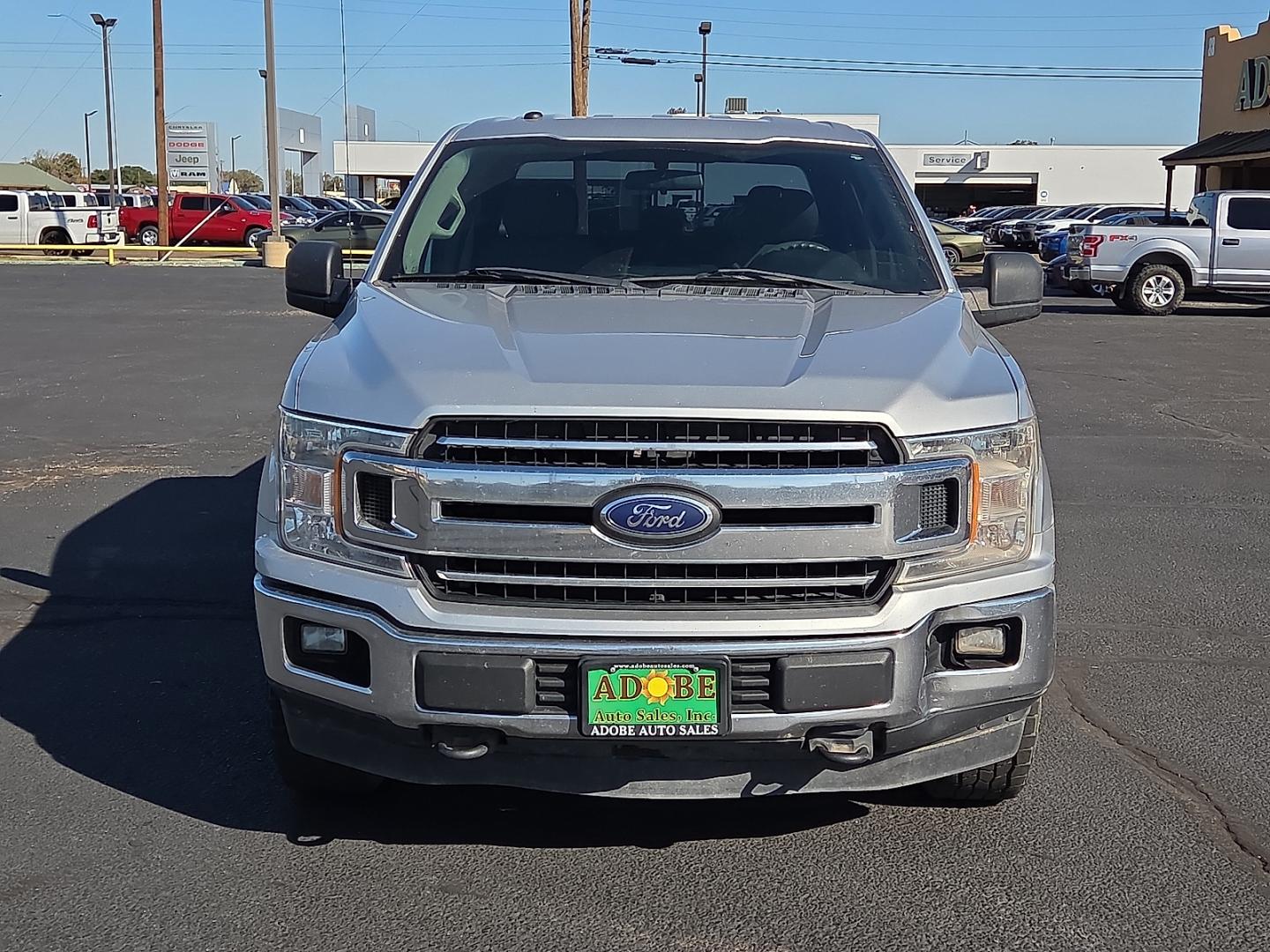 2018 Ingot Silver Metallic - UX /Medium Earth Gray - MG Ford F-150 XLT (1FTEW1EB6JF) with an 3.3L V-6 port/direct injection, DOHC, Ti-VCT variable valve control, regular gasoline, engine with 290HP engine, located at 4711 Ave Q, Lubbock, TX, 79412, (806) 687-2362, 33.551304, -101.855293- Photo#7