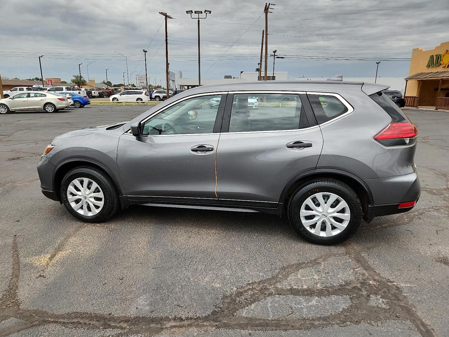2017 GRAY Nissan Rogue S (JN8AT2MT7HW) with an 2.5L I-4 DOHC, variable valve control, regular unleaded, engine with 170HP engine, located at 4711 Ave Q, Lubbock, TX, 79412, (806) 687-2362, 33.551304, -101.855293 - Photo#1