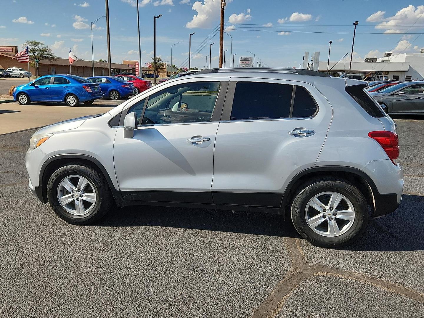 2018 SILVER Chevrolet Trax LT (KL7CJLSB4JB) with an ECOTEC 1.4L I-4 DOHC, VVT variable valve control, intercooled turbo, regular unleaded, engine with 138HP engine, located at 4711 Ave Q, Lubbock, TX, 79412, (806) 687-2362, 33.551304, -101.855293 - Photo#1