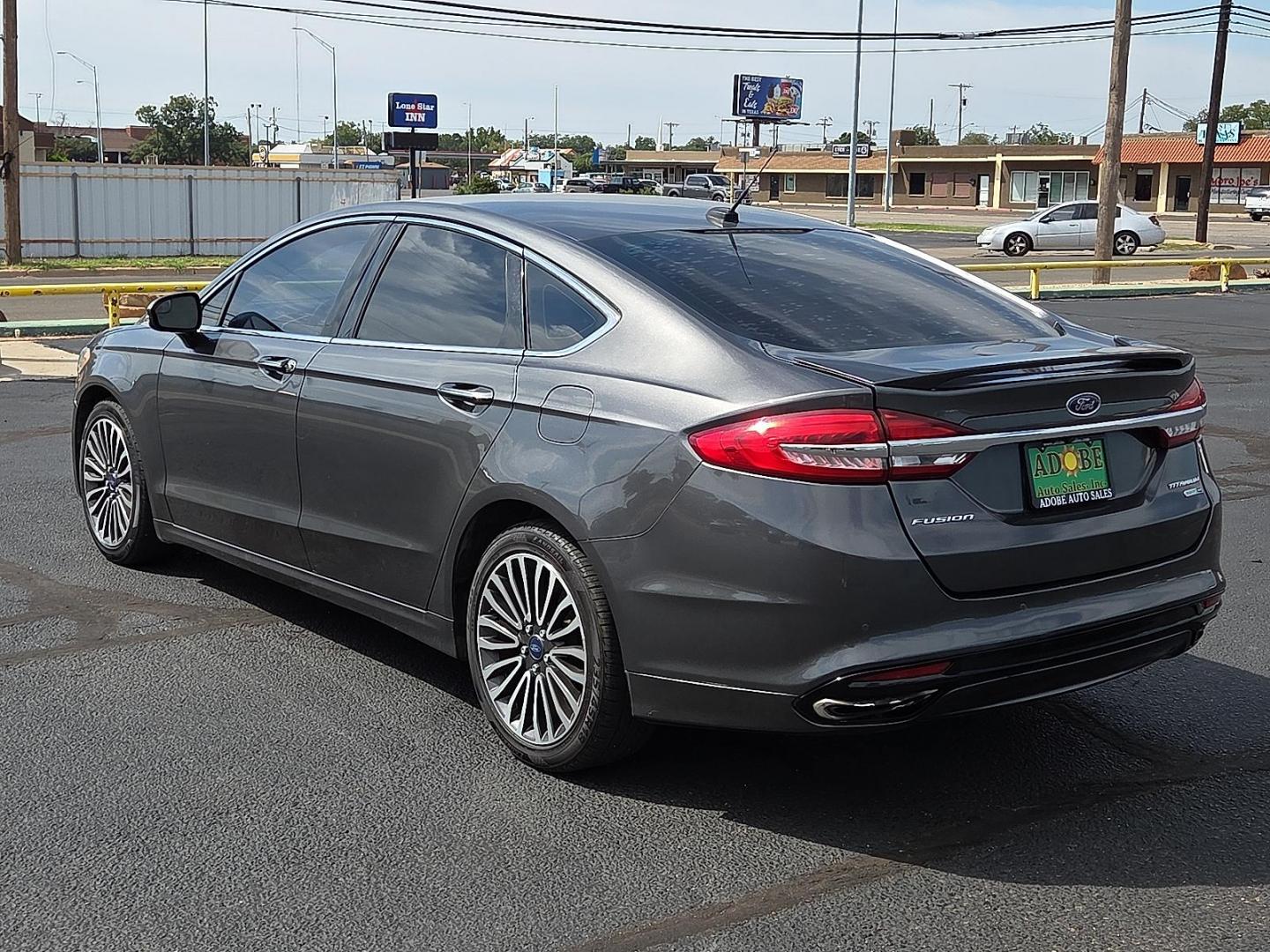 2018 Magnetic Metallic - J7 /Medium Soft Ceramic - CM Ford Fusion Titanium (3FA6P0D98JR) with an EcoBoost 2L I-4 gasoline direct injection, DOHC, variable valve control, intercooled turbo, regular unleaded, engine with 231HP engine, located at 4711 Ave Q, Lubbock, TX, 79412, (806) 687-2362, 33.551304, -101.855293 - Photo#2