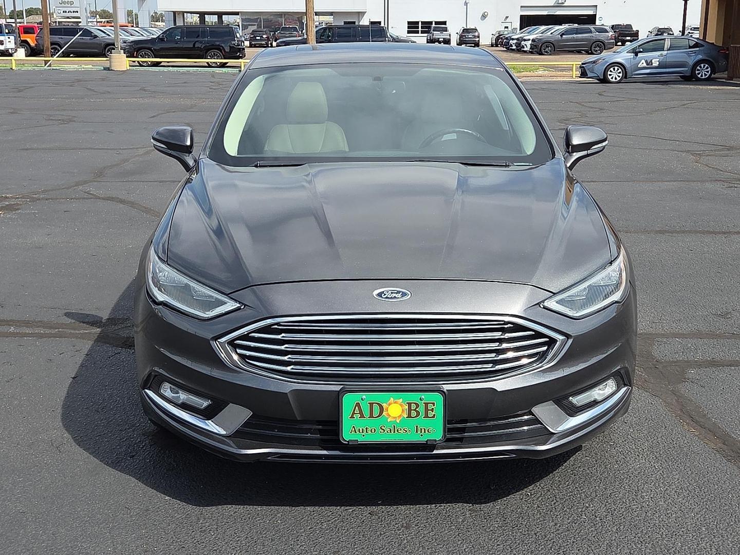 2018 Magnetic Metallic - J7 /Medium Soft Ceramic - CM Ford Fusion Titanium (3FA6P0D98JR) with an EcoBoost 2L I-4 gasoline direct injection, DOHC, variable valve control, intercooled turbo, regular unleaded, engine with 231HP engine, located at 4711 Ave Q, Lubbock, TX, 79412, (806) 687-2362, 33.551304, -101.855293 - Photo#7