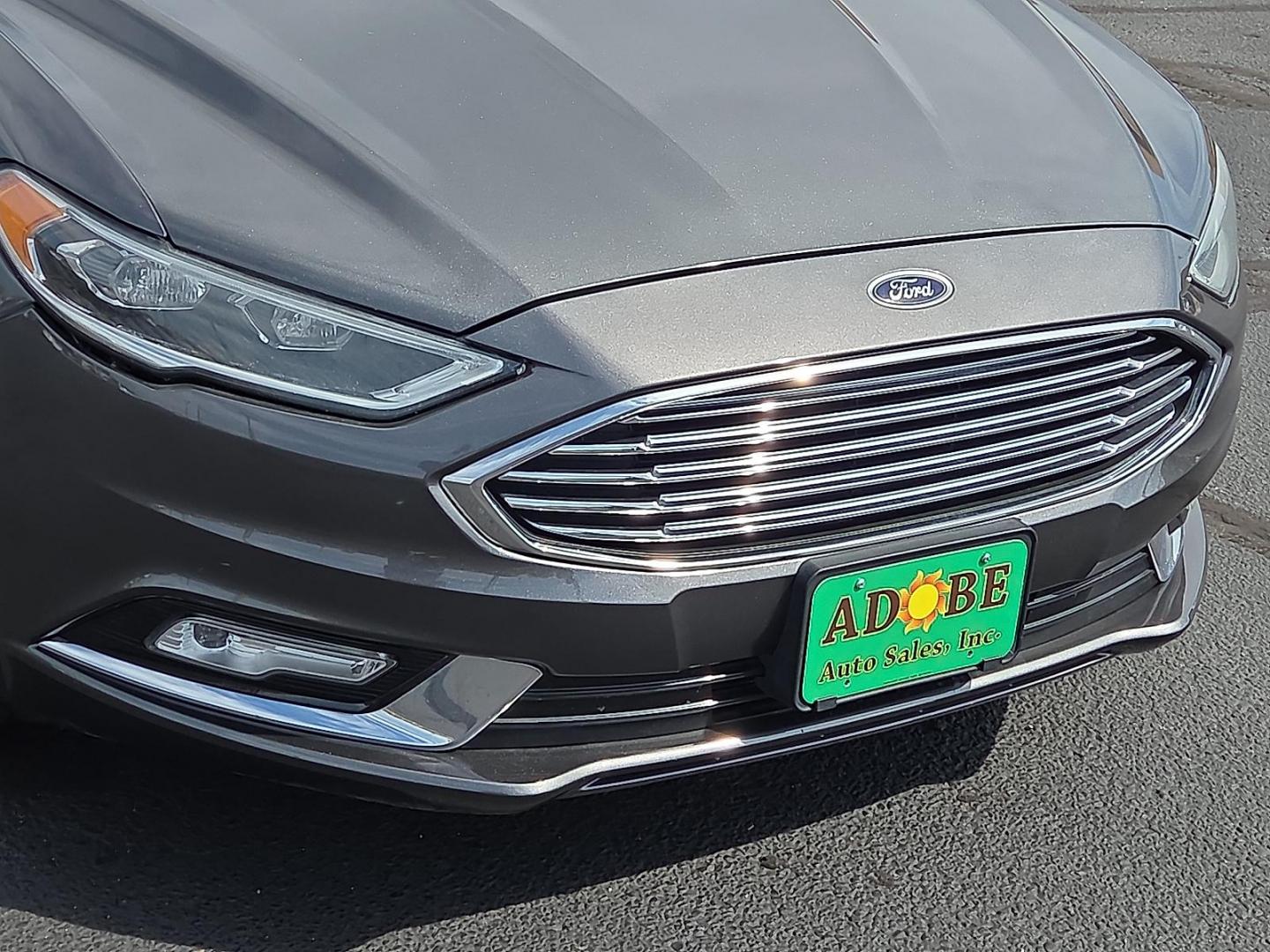 2018 Magnetic Metallic - J7 /Medium Soft Ceramic - CM Ford Fusion Titanium (3FA6P0D98JR) with an EcoBoost 2L I-4 gasoline direct injection, DOHC, variable valve control, intercooled turbo, regular unleaded, engine with 231HP engine, located at 4711 Ave Q, Lubbock, TX, 79412, (806) 687-2362, 33.551304, -101.855293 - Photo#8