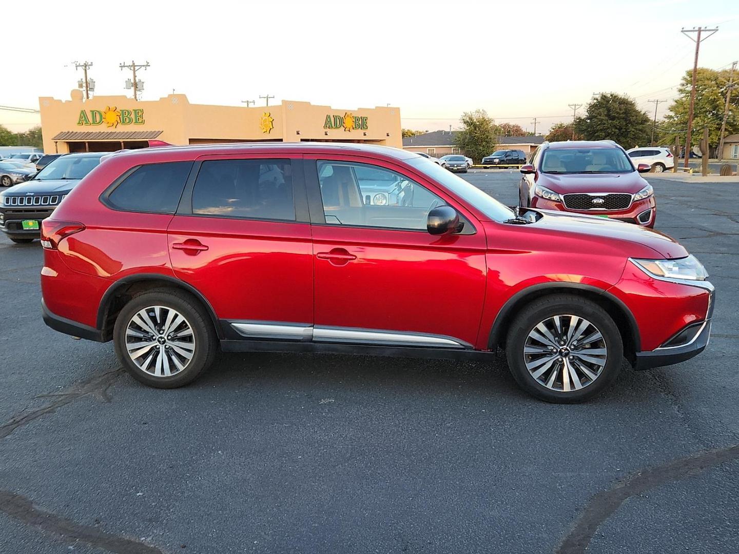 2020 RED Mitsubishi Outlander ES 2.4 (JA4AD2A31LZ) with an 2.4L I-4 MIVEC variable valve control, regular unleaded, engine with 166HP engine, located at 4711 Ave Q, Lubbock, TX, 79412, (806) 687-2362, 33.551304, -101.855293 - Photo#4