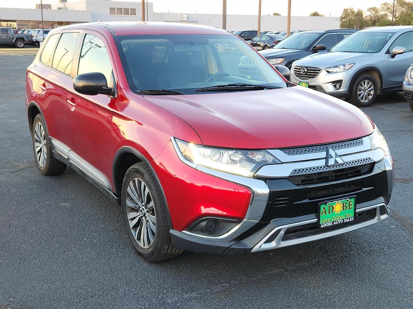 2020 RED Mitsubishi Outlander ES 2.4 (JA4AD2A31LZ) with an 2.4L I-4 MIVEC variable valve control, regular unleaded, engine with 166HP engine, located at 4711 Ave Q, Lubbock, TX, 79412, (806) 687-2362, 33.551304, -101.855293 - Photo#5