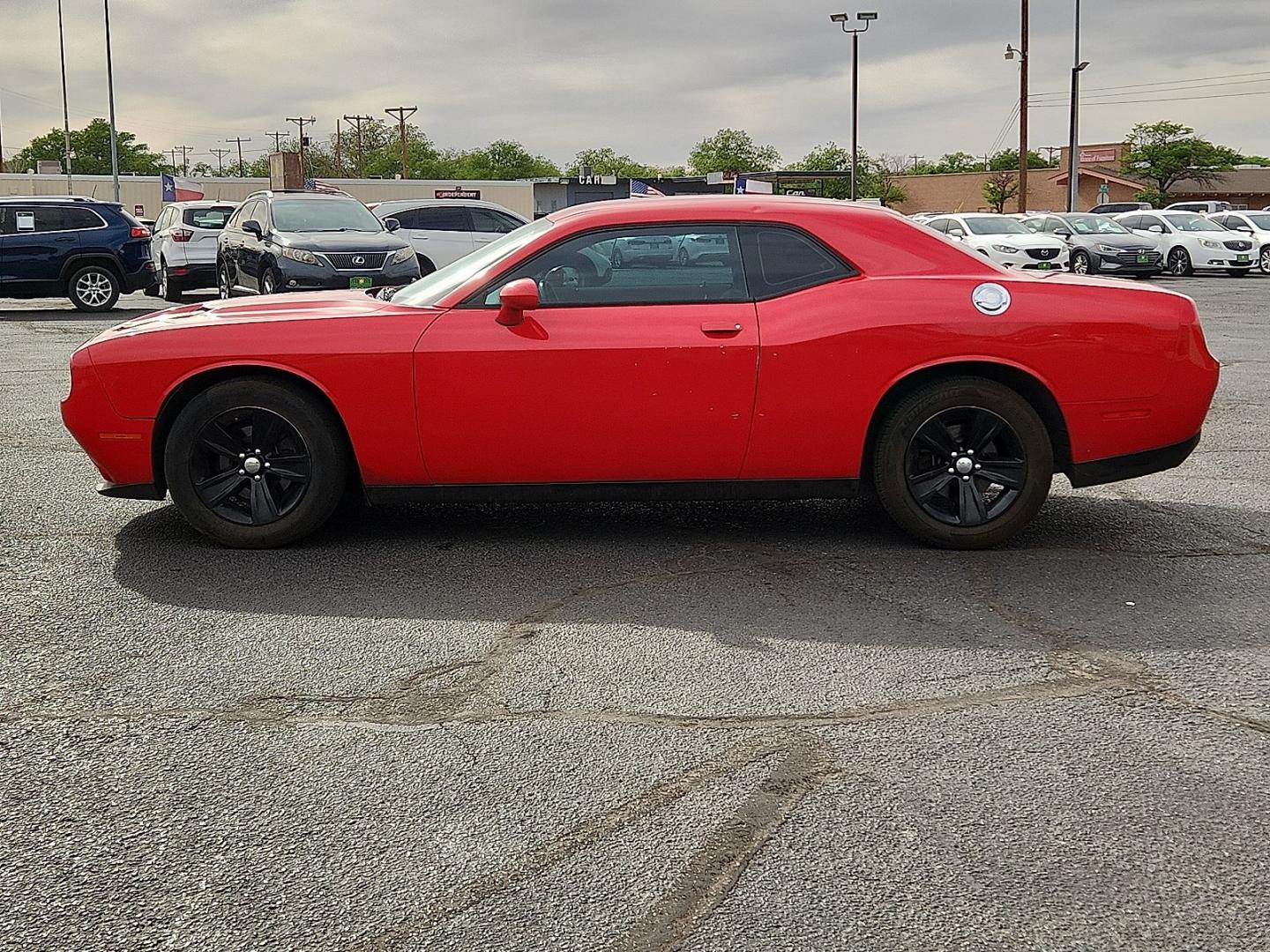 2016 RED /Black - X9 Dodge Challenger SXT (2C3CDZAG2GH) with an Pentastar 3.6L V-6 DOHC, variable valve control, regular unleaded, engine with 305HP engine, located at 4711 Ave Q, Lubbock, TX, 79412, (806) 687-2362, 33.551304, -101.855293 - Photo#1