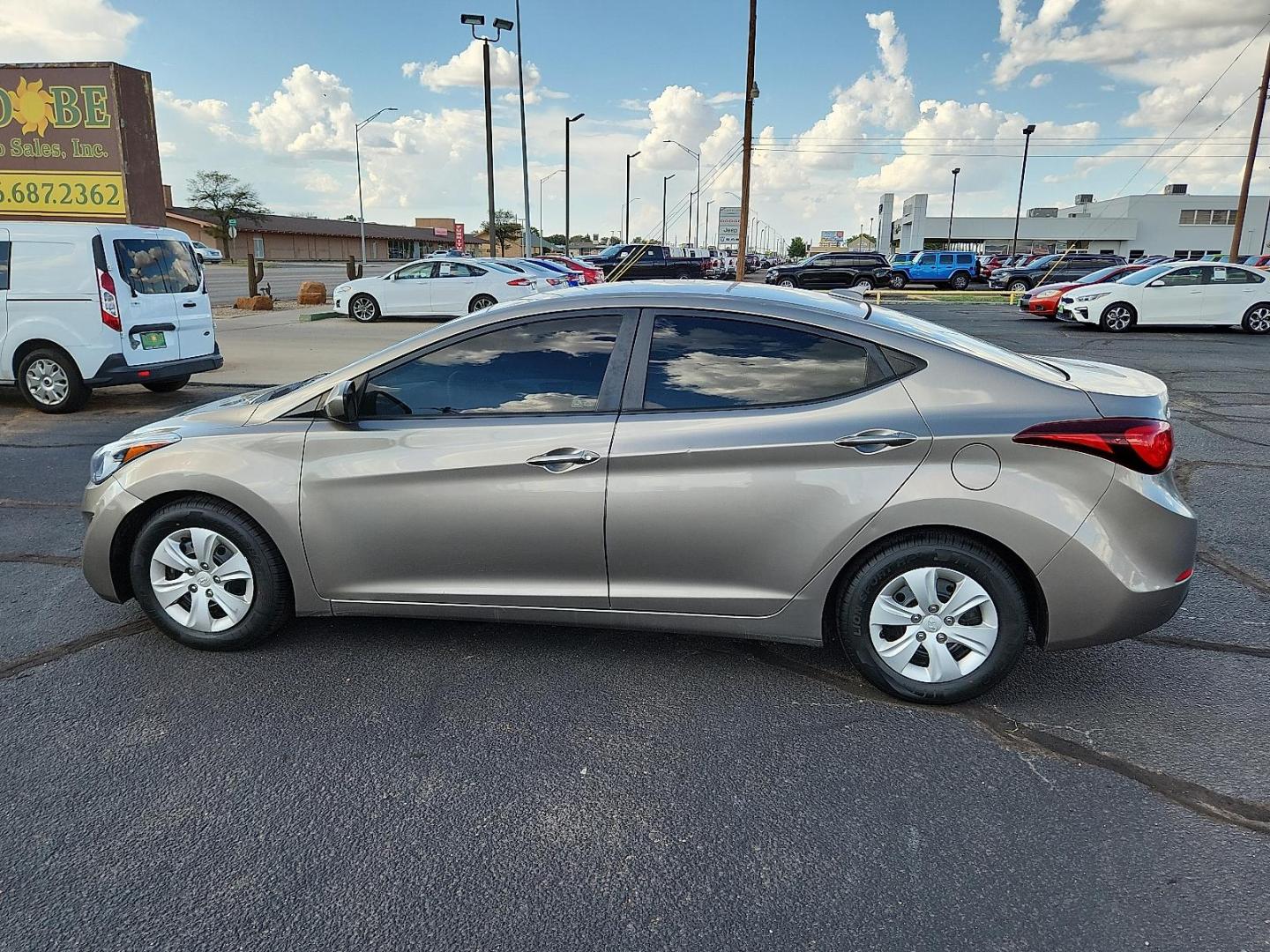2016 BROWN Hyundai Elantra SE (5NPDH4AE1GH) with an Nu 1.8L I-4 DOHC, D-CVVT variable valve control, regular unleaded, engine with 145HP engine, located at 4711 Ave Q, Lubbock, TX, 79412, (806) 687-2362, 33.551304, -101.855293 - Photo#1