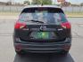 2015 Deep Crystal Blue Mica - 42M /Sand - KC4 Mazda CX-5 Grand Touring (JM3KE2DY2F0) with an SKYACTIV-G 2.5L I-4 gasoline direct injection, DOHC, variable valve control, regular unleaded, engine with 184HP engine, located at 4711 Ave Q, Lubbock, TX, 79412, (806) 687-2362, 33.551304, -101.855293 - Photo#3