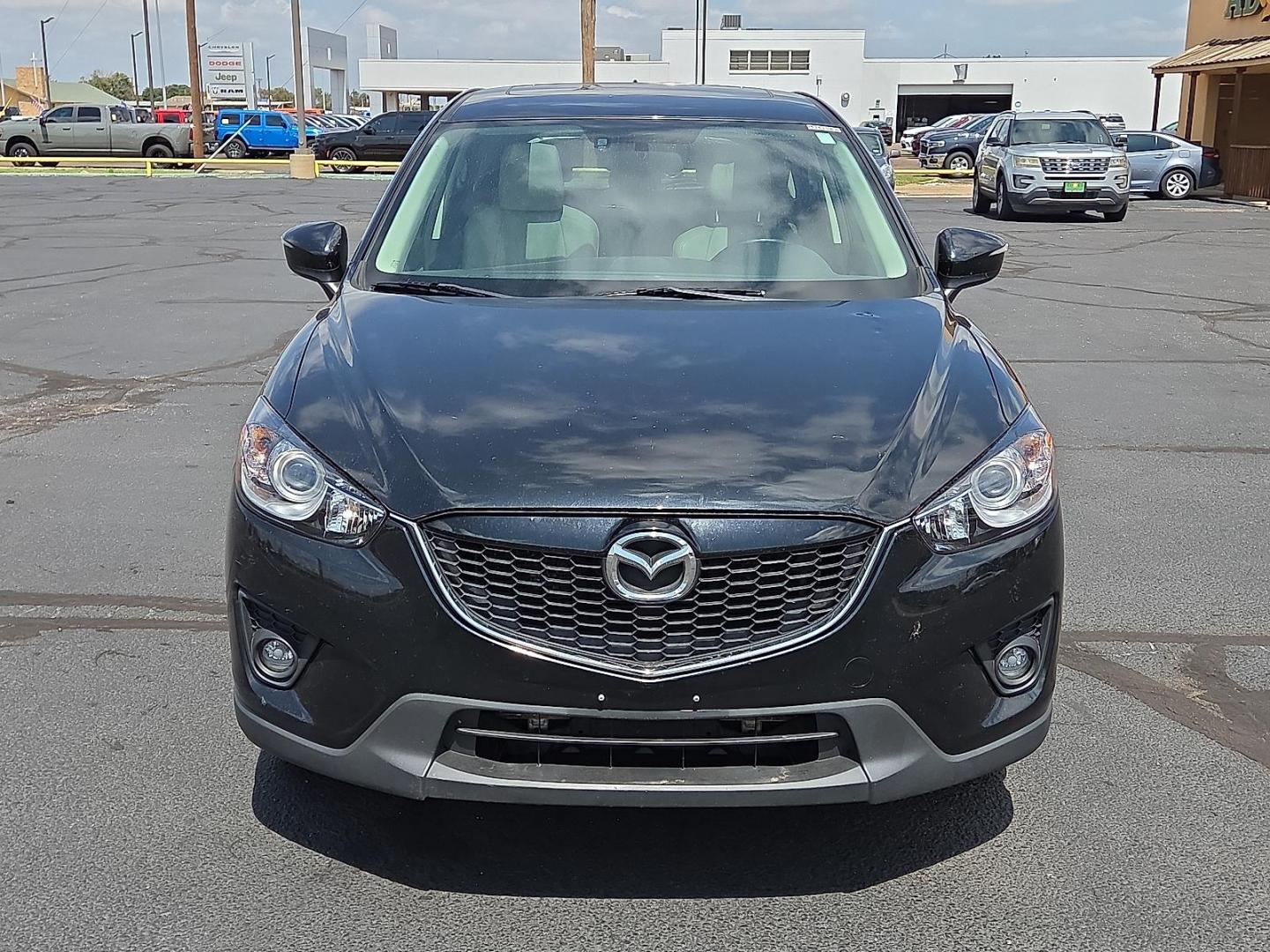 2015 Deep Crystal Blue Mica - 42M /Sand - KC4 Mazda CX-5 Grand Touring (JM3KE2DY2F0) with an SKYACTIV-G 2.5L I-4 gasoline direct injection, DOHC, variable valve control, regular unleaded, engine with 184HP engine, located at 4711 Ave Q, Lubbock, TX, 79412, (806) 687-2362, 33.551304, -101.855293 - Photo#7