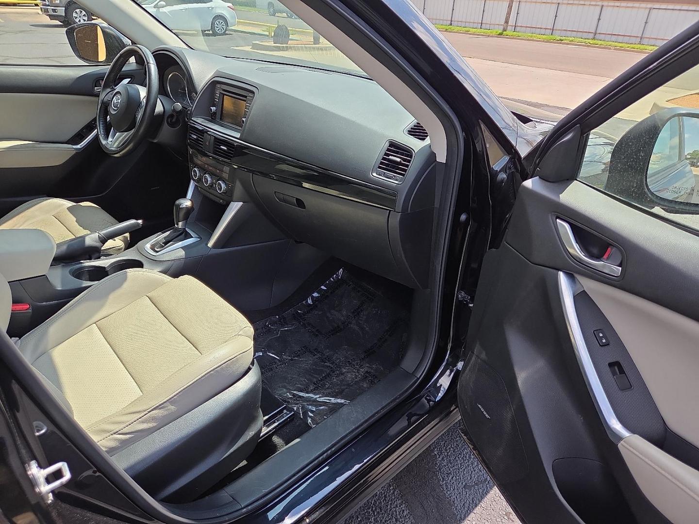 2015 Deep Crystal Blue Mica - 42M /Sand - KC4 Mazda CX-5 Grand Touring (JM3KE2DY2F0) with an SKYACTIV-G 2.5L I-4 gasoline direct injection, DOHC, variable valve control, regular unleaded, engine with 184HP engine, located at 4711 Ave Q, Lubbock, TX, 79412, (806) 687-2362, 33.551304, -101.855293 - Photo#8