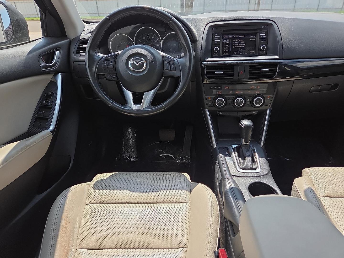 2015 Deep Crystal Blue Mica - 42M /Sand - KC4 Mazda CX-5 Grand Touring (JM3KE2DY2F0) with an SKYACTIV-G 2.5L I-4 gasoline direct injection, DOHC, variable valve control, regular unleaded, engine with 184HP engine, located at 4711 Ave Q, Lubbock, TX, 79412, (806) 687-2362, 33.551304, -101.855293 - Photo#17