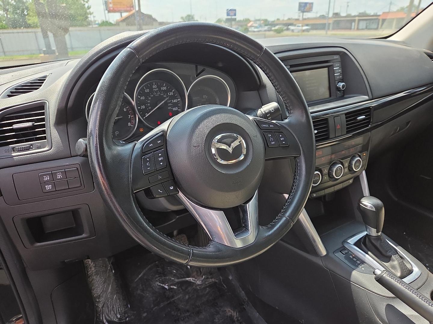 2015 Deep Crystal Blue Mica - 42M /Sand - KC4 Mazda CX-5 Grand Touring (JM3KE2DY2F0) with an SKYACTIV-G 2.5L I-4 gasoline direct injection, DOHC, variable valve control, regular unleaded, engine with 184HP engine, located at 4711 Ave Q, Lubbock, TX, 79412, (806) 687-2362, 33.551304, -101.855293 - Photo#23