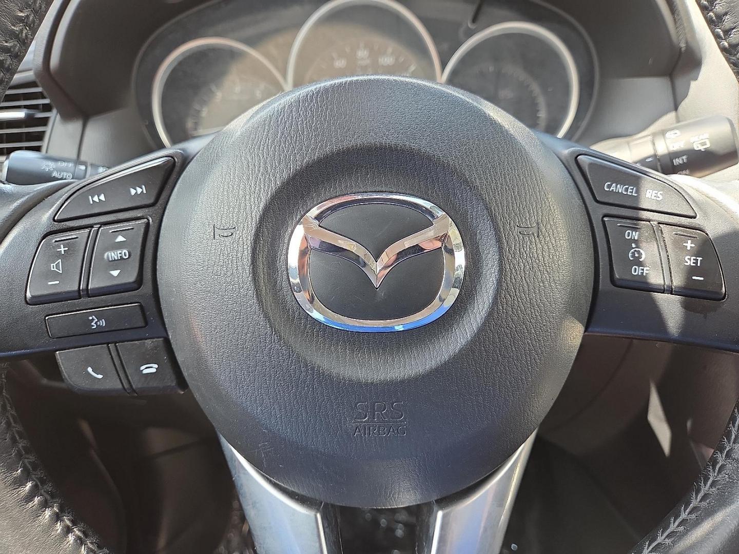 2015 Deep Crystal Blue Mica - 42M /Sand - KC4 Mazda CX-5 Grand Touring (JM3KE2DY2F0) with an SKYACTIV-G 2.5L I-4 gasoline direct injection, DOHC, variable valve control, regular unleaded, engine with 184HP engine, located at 4711 Ave Q, Lubbock, TX, 79412, (806) 687-2362, 33.551304, -101.855293 - Photo#30