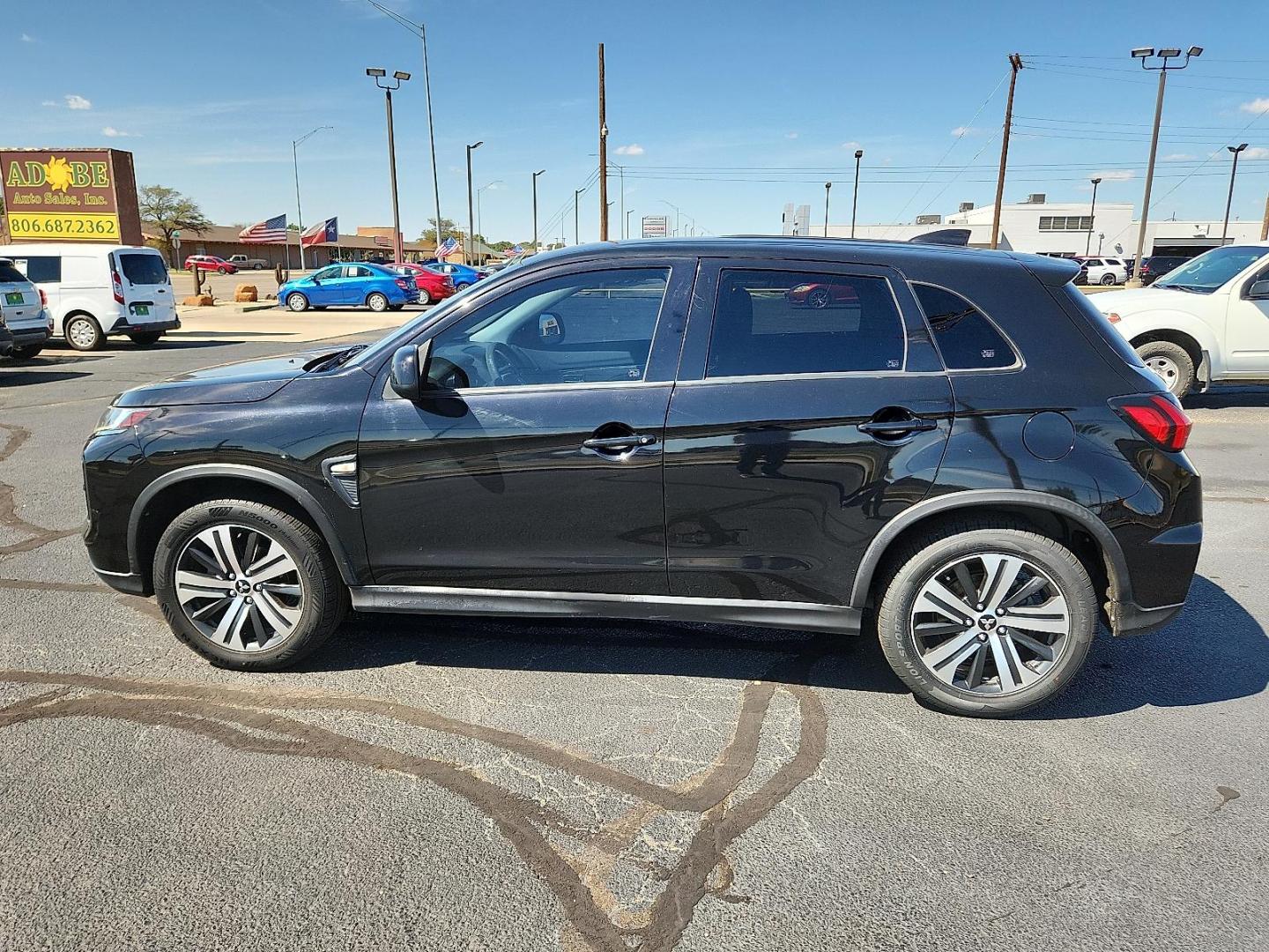 2020 BLACK Mitsubishi Outlander Sport 2.0 ES (JA4AP3AU3LU) with an 2L I-4 DOHC, MIVEC variable valve control, regular unleaded, engine with 148HP engine, located at 4711 Ave Q, Lubbock, TX, 79412, (806) 687-2362, 33.551304, -101.855293 - Photo#1