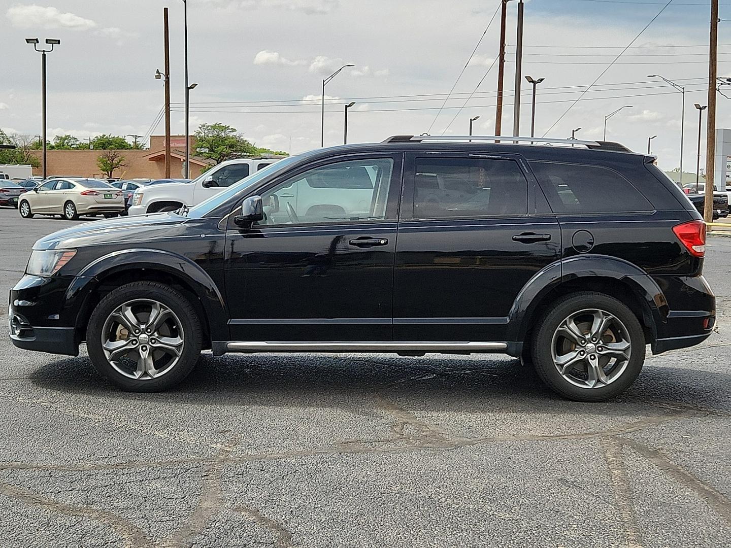 2017 BLACK /Black - X9 Dodge Journey Crossroad Plus (3C4PDCGB4HT) with an Tigershark MultiAir 2.4L I-4 DOHC, variable valve control, regular unleaded, engine with 173HP engine, located at 4711 Ave Q, Lubbock, TX, 79412, (806) 687-2362, 33.551304, -101.855293- Photo#1