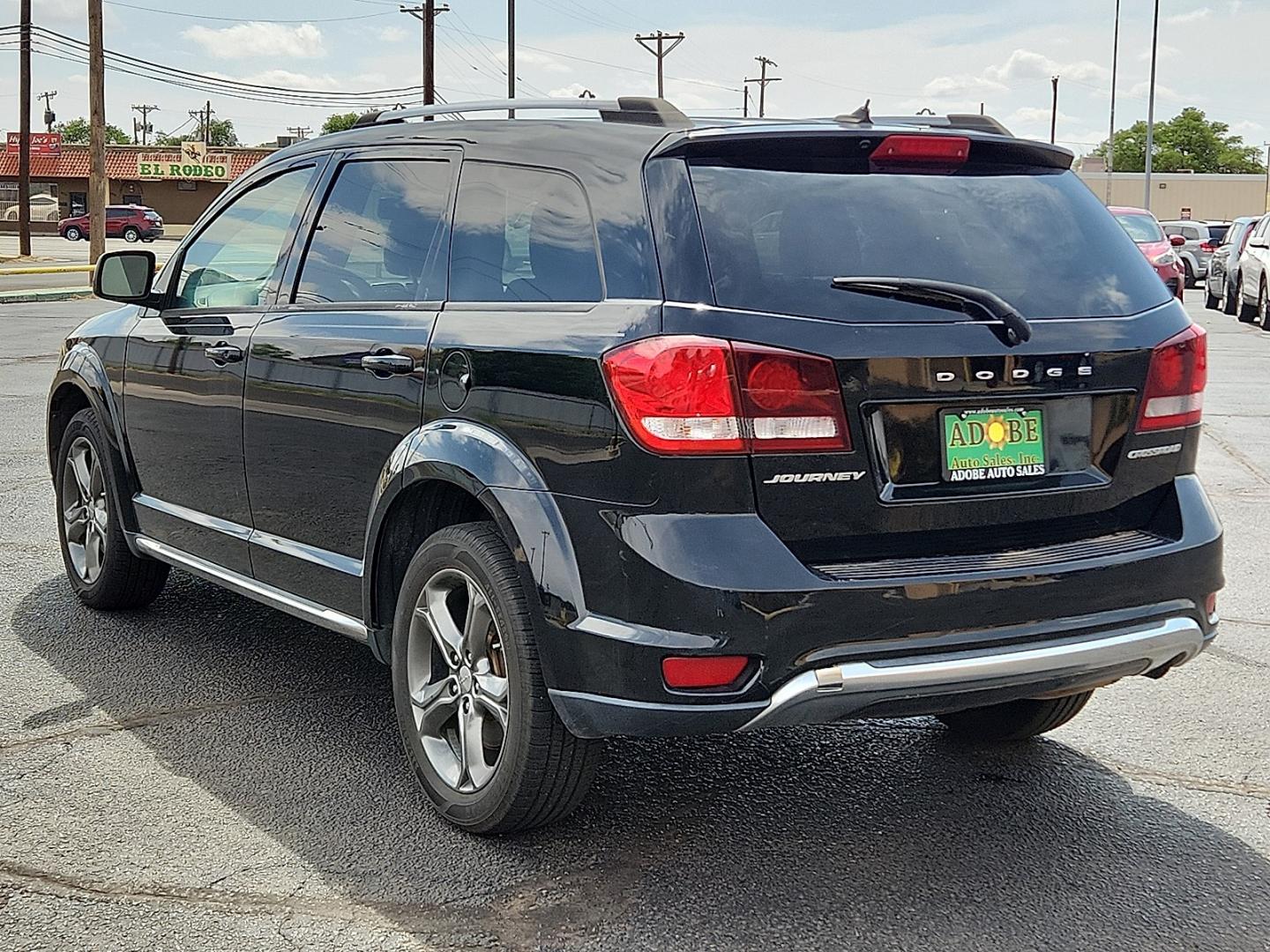 2017 BLACK /Black - X9 Dodge Journey Crossroad Plus (3C4PDCGB4HT) with an Tigershark MultiAir 2.4L I-4 DOHC, variable valve control, regular unleaded, engine with 173HP engine, located at 4711 Ave Q, Lubbock, TX, 79412, (806) 687-2362, 33.551304, -101.855293- Photo#2