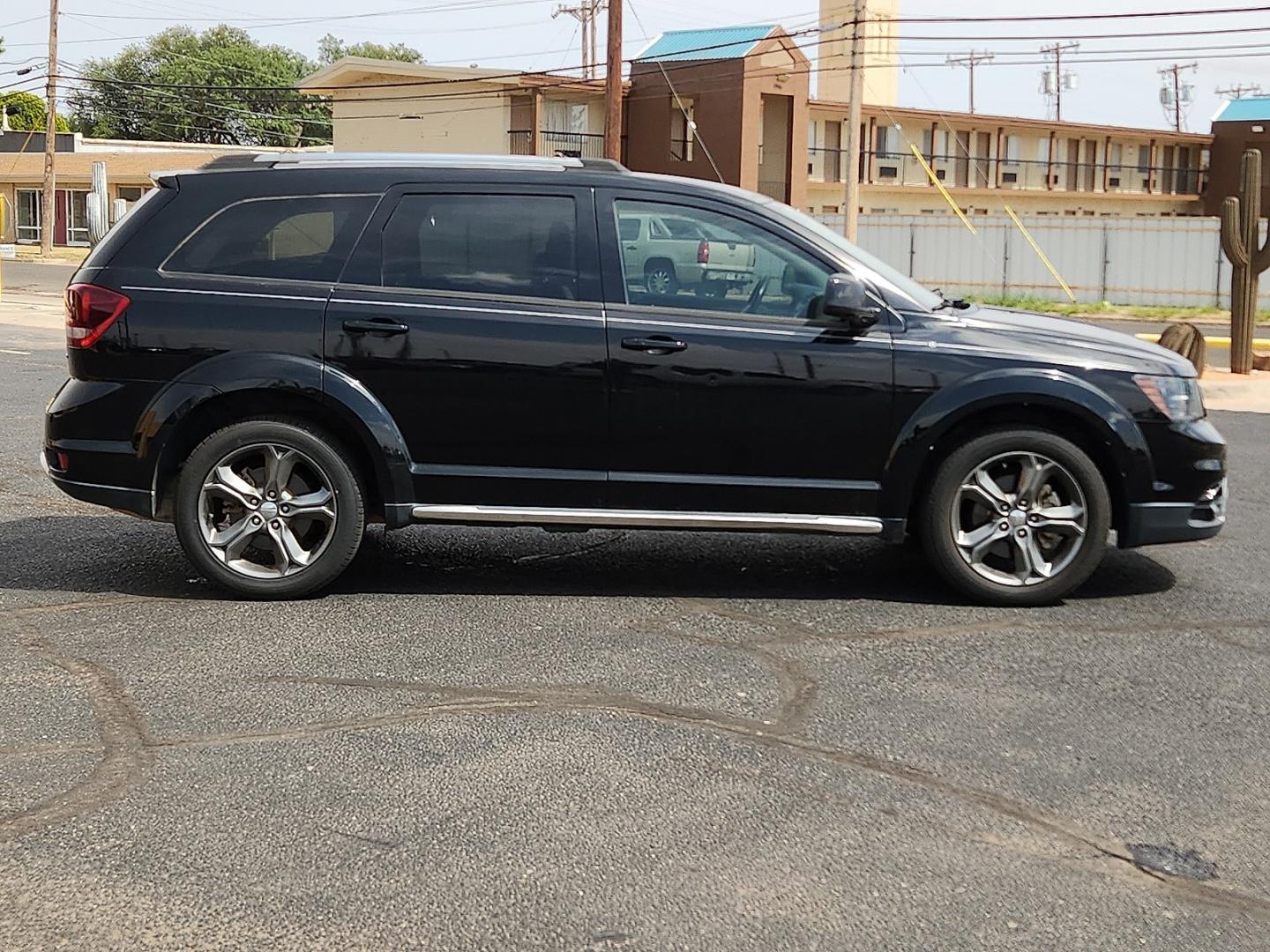 2017 BLACK /Black - X9 Dodge Journey Crossroad Plus (3C4PDCGB4HT) with an Tigershark MultiAir 2.4L I-4 DOHC, variable valve control, regular unleaded, engine with 173HP engine, located at 4711 Ave Q, Lubbock, TX, 79412, (806) 687-2362, 33.551304, -101.855293- Photo#4