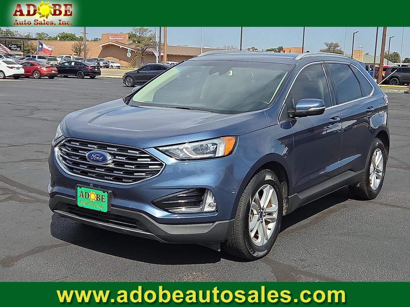 2019 Blue Metallic - FT /Dune - VD Ford Edge SEL (2FMPK3J91KB) with an EcoBoost 2L I-4 gasoline direct injection, DOHC, variable valve control, intercooled turbo, premium unleaded, engine with 250HP engine, located at 4711 Ave Q, Lubbock, TX, 79412, (806) 687-2362, 33.551304, -101.855293 - Photo#0
