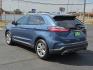 2019 Blue Metallic - FT /Dune - VD Ford Edge SEL (2FMPK3J91KB) with an EcoBoost 2L I-4 gasoline direct injection, DOHC, variable valve control, intercooled turbo, premium unleaded, engine with 250HP engine, located at 4711 Ave Q, Lubbock, TX, 79412, (806) 687-2362, 33.551304, -101.855293 - Photo#2