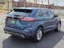 2019 Blue Metallic - FT /Dune - VD Ford Edge SEL (2FMPK3J91KB) with an EcoBoost 2L I-4 gasoline direct injection, DOHC, variable valve control, intercooled turbo, premium unleaded, engine with 250HP engine, located at 4711 Ave Q, Lubbock, TX, 79412, (806) 687-2362, 33.551304, -101.855293 - Photo#4