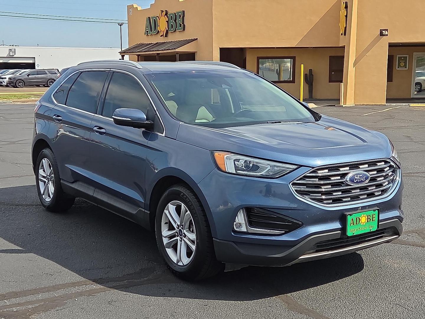 2019 Blue Metallic - FT /Dune - VD Ford Edge SEL (2FMPK3J91KB) with an EcoBoost 2L I-4 gasoline direct injection, DOHC, variable valve control, intercooled turbo, premium unleaded, engine with 250HP engine, located at 4711 Ave Q, Lubbock, TX, 79412, (806) 687-2362, 33.551304, -101.855293 - Photo#6
