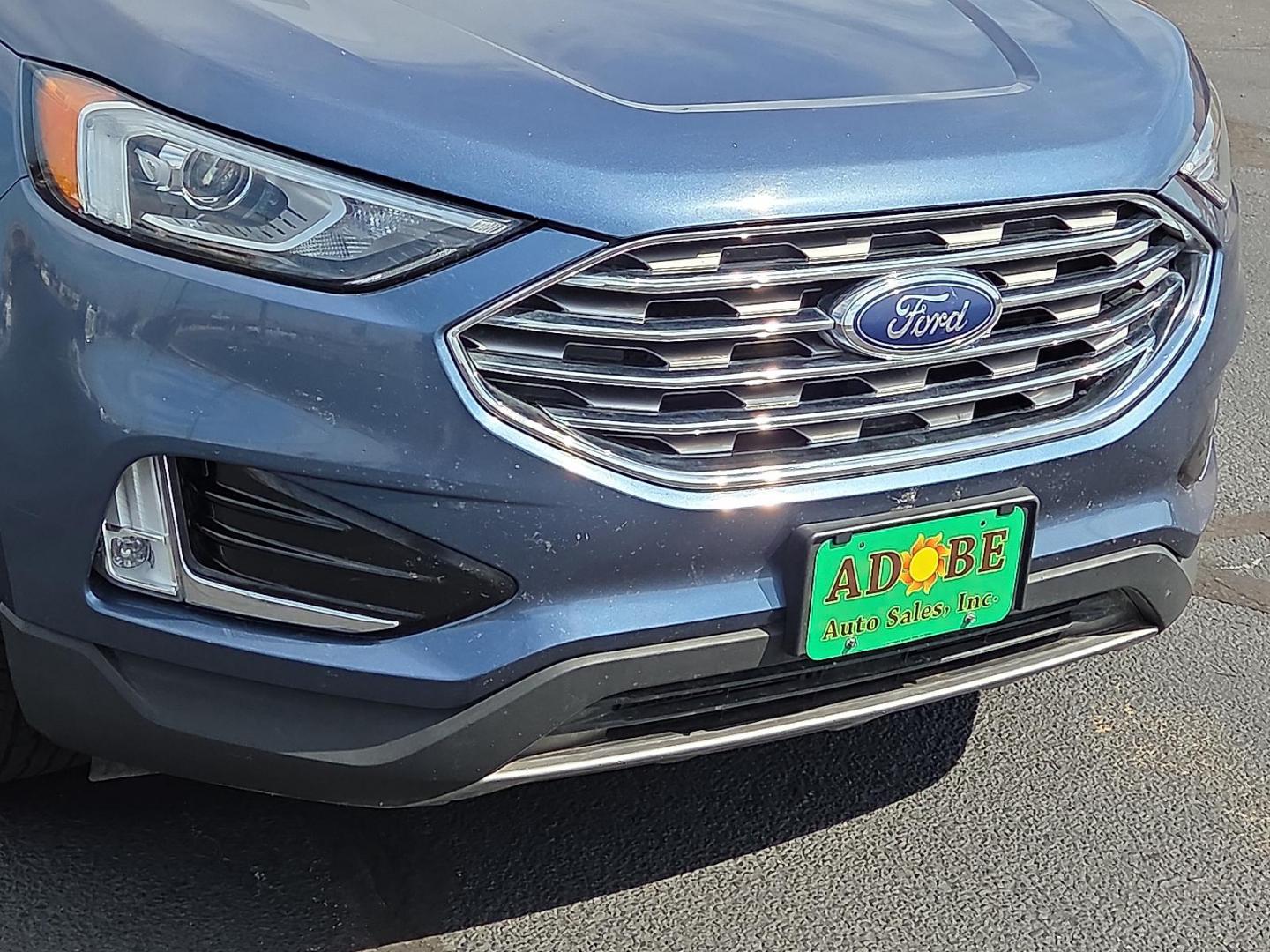 2019 Blue Metallic - FT /Dune - VD Ford Edge SEL (2FMPK3J91KB) with an EcoBoost 2L I-4 gasoline direct injection, DOHC, variable valve control, intercooled turbo, premium unleaded, engine with 250HP engine, located at 4711 Ave Q, Lubbock, TX, 79412, (806) 687-2362, 33.551304, -101.855293 - Photo#8