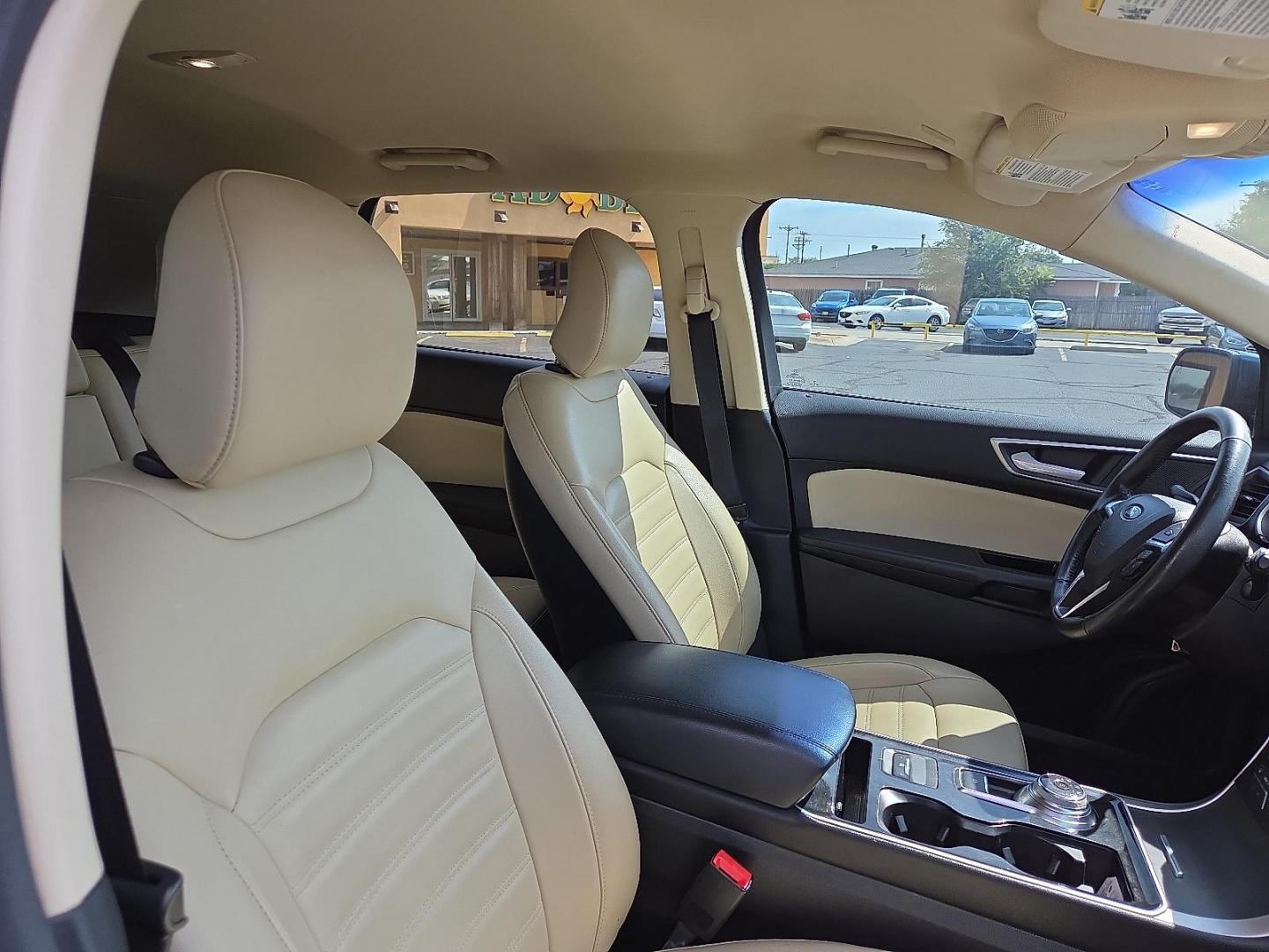 2019 Blue Metallic - FT /Dune - VD Ford Edge SEL (2FMPK3J91KB) with an EcoBoost 2L I-4 gasoline direct injection, DOHC, variable valve control, intercooled turbo, premium unleaded, engine with 250HP engine, located at 4711 Ave Q, Lubbock, TX, 79412, (806) 687-2362, 33.551304, -101.855293 - Photo#13