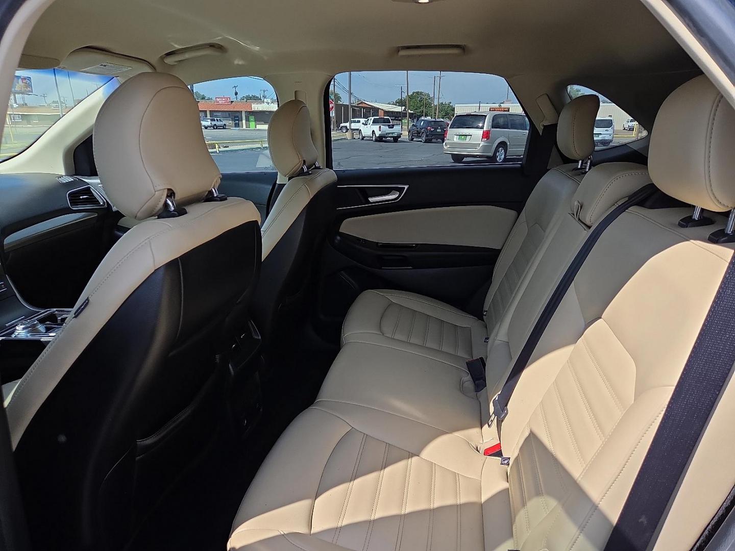 2019 Blue Metallic - FT /Dune - VD Ford Edge SEL (2FMPK3J91KB) with an EcoBoost 2L I-4 gasoline direct injection, DOHC, variable valve control, intercooled turbo, premium unleaded, engine with 250HP engine, located at 4711 Ave Q, Lubbock, TX, 79412, (806) 687-2362, 33.551304, -101.855293 - Photo#17