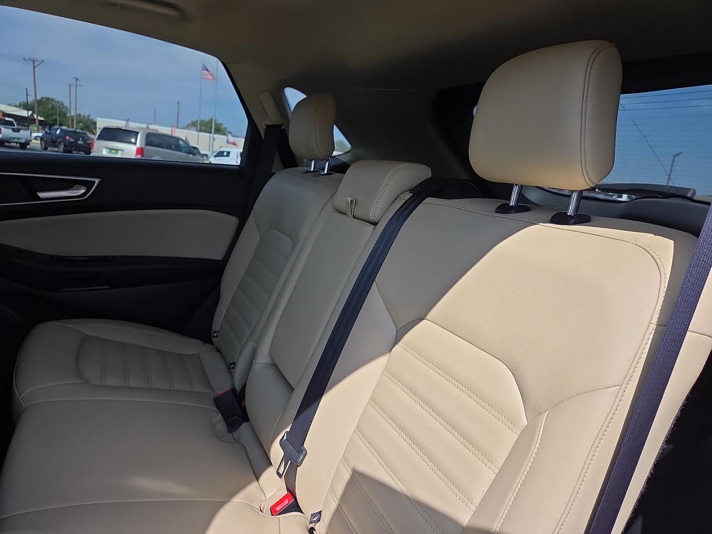 2019 Blue Metallic - FT /Dune - VD Ford Edge SEL (2FMPK3J91KB) with an EcoBoost 2L I-4 gasoline direct injection, DOHC, variable valve control, intercooled turbo, premium unleaded, engine with 250HP engine, located at 4711 Ave Q, Lubbock, TX, 79412, (806) 687-2362, 33.551304, -101.855293 - Photo#19