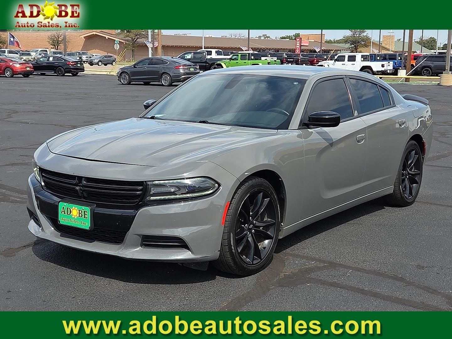 2018 Destroyer Gray Clearcoat - PDN /Black - X9 Dodge Charger SXT RWD (2C3CDXBG3JH) with an Pentastar 3.6L V-6 DOHC, variable valve control, regular unleaded, engine with 292HP engine, located at 4711 Ave Q, Lubbock, TX, 79412, (806) 687-2362, 33.551304, -101.855293 - Photo#0