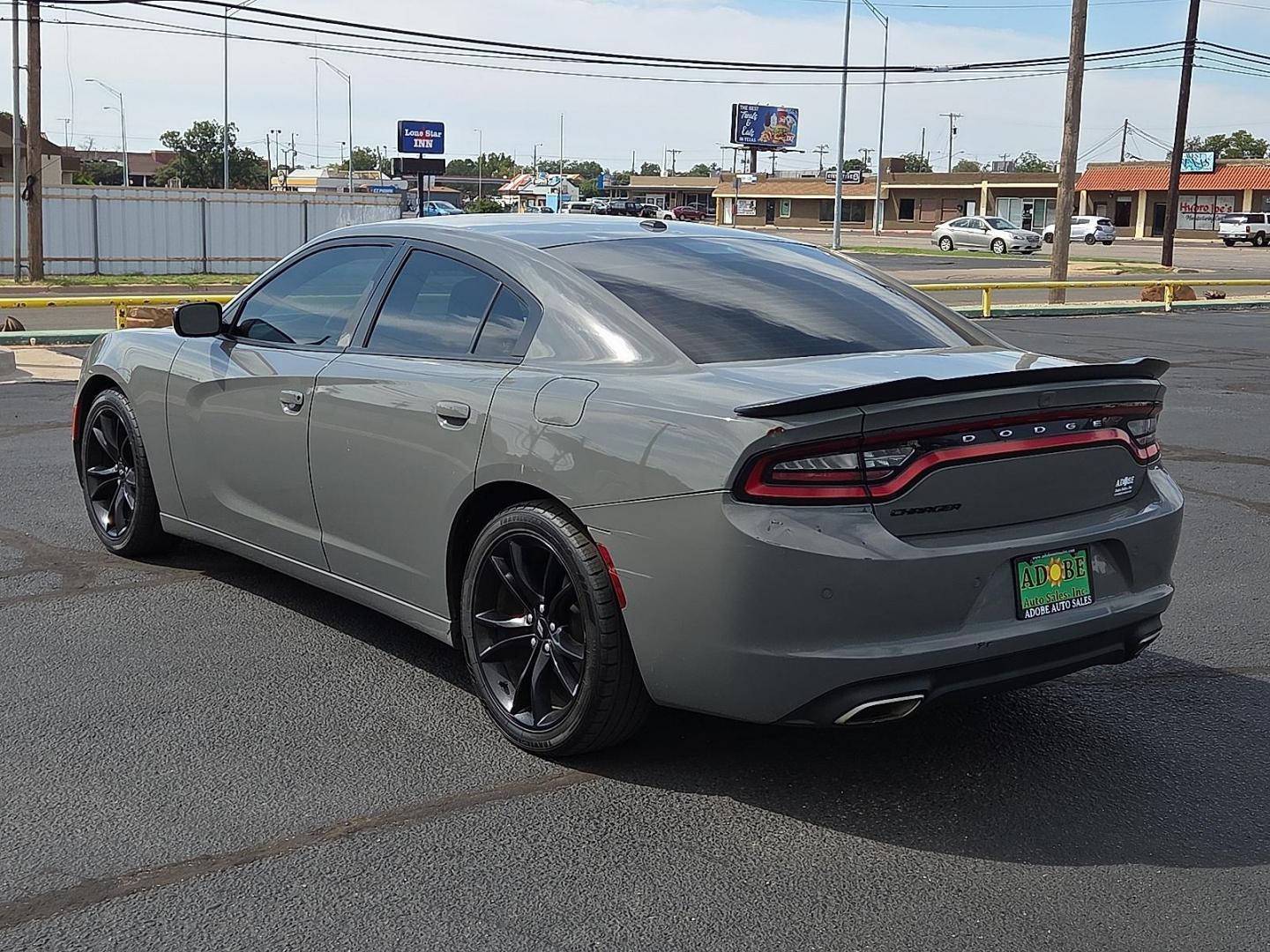 2018 Destroyer Gray Clearcoat - PDN /Black - X9 Dodge Charger SXT RWD (2C3CDXBG3JH) with an Pentastar 3.6L V-6 DOHC, variable valve control, regular unleaded, engine with 292HP engine, located at 4711 Ave Q, Lubbock, TX, 79412, (806) 687-2362, 33.551304, -101.855293 - Photo#2
